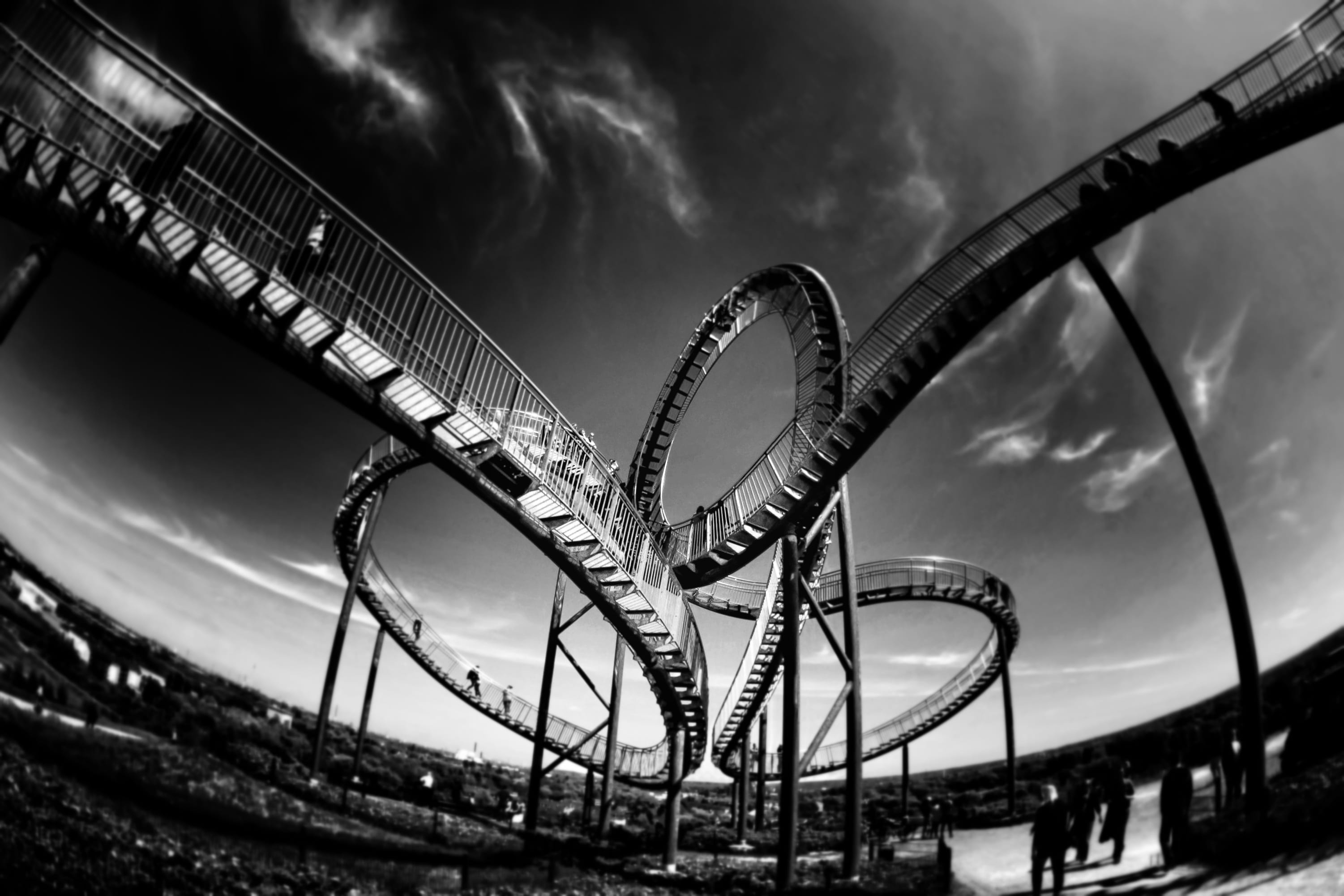 theme, low angle view, no people, overcast, entertainment, excitement, metal, park, grayscale, amusement park ride, rail, steel, amusement, looping, speed, HD Wallpaper