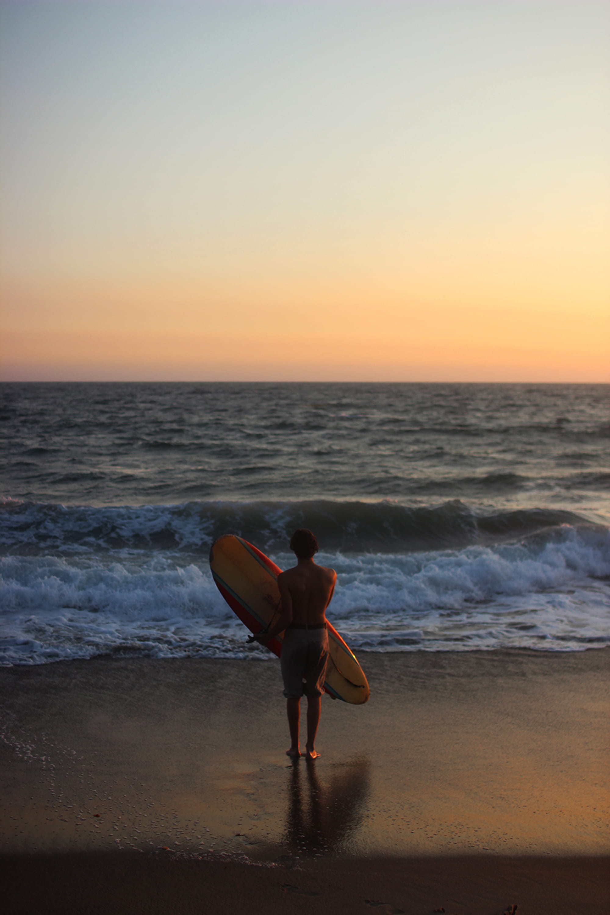 sea, lifestyles, land, carrying, nature, one person, beauty in nature, real people, scenics - nature, holding, beach, daytime, surf, leisure activity, standing, Phone HD Wallpaper