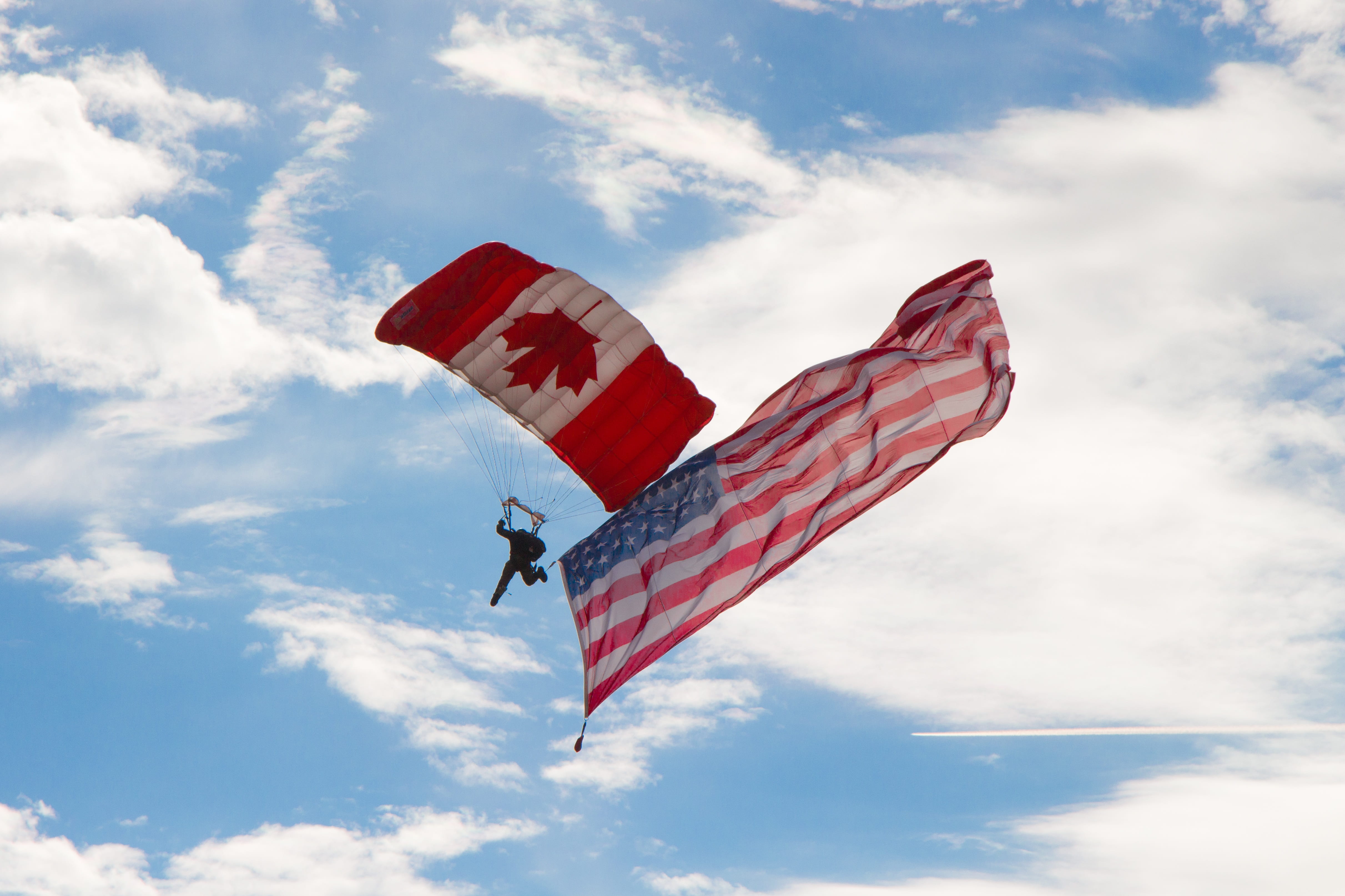 fun, 4K, jumping, fly, flight, paratrooper, symbol, adrenaline, flag, airborne, gliding, plane, courage, outdoors, velocity, wind, environment, leisure, HD Wallpaper