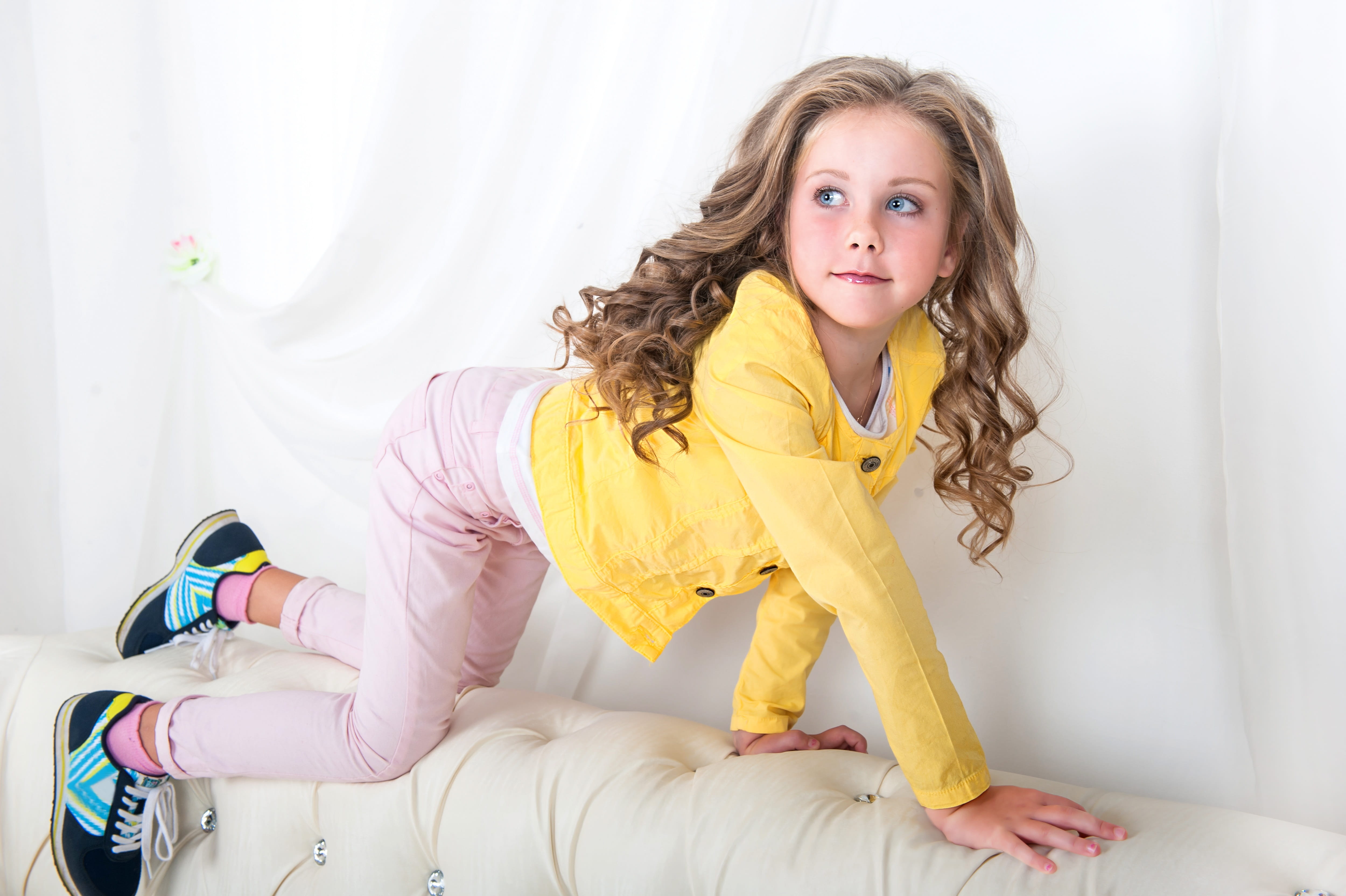 one person, adult, women, hair, fashion, model, kids, yellow, child, hairstyle, girls, baby, childhood, looking at camera, bed, eyes, contemplation, furniture, HD Wallpaper