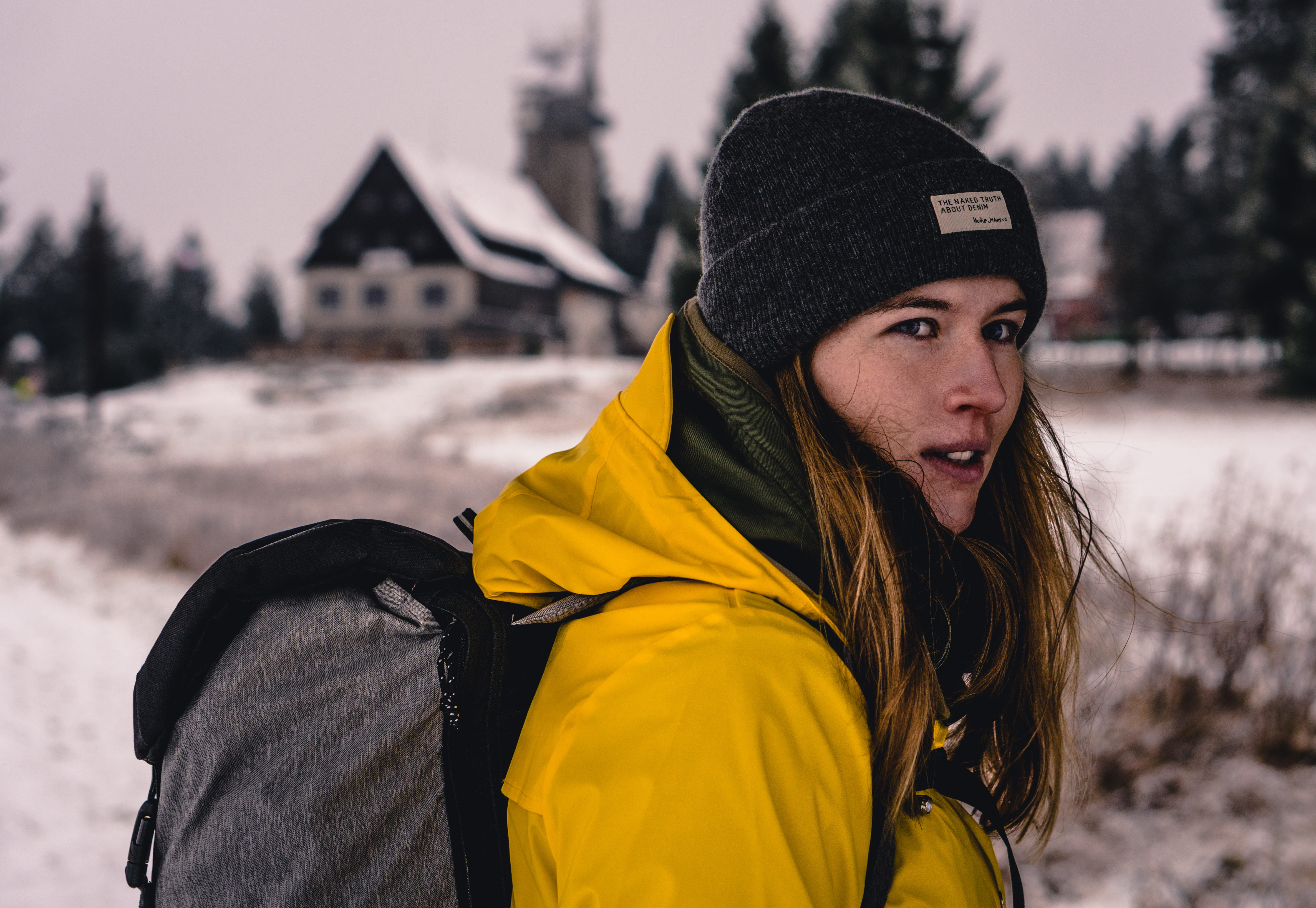 standing, hat, selective, one person, snow, female, outdoors, photography, girl, backpack, warm clothing, winter, coat, lifestyles, jacket, scarf, yellow, HD Wallpaper