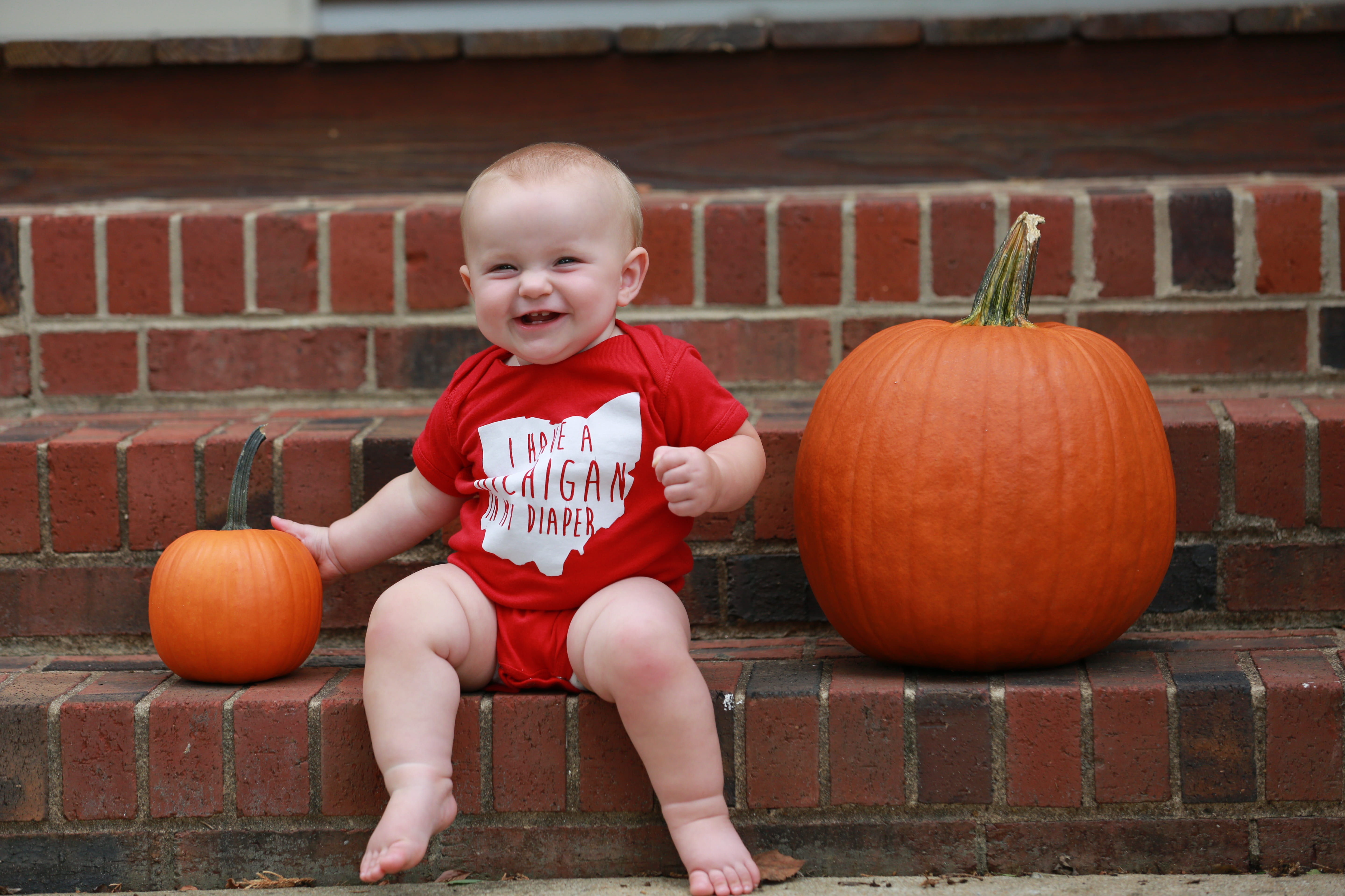 portrait, one person, pumpkin, smiling, young, buckeyes, football, happiness, ohio state, onesie, game, rivalry, halloween, 5K, baby, sitting, food, childhood, HD Wallpaper