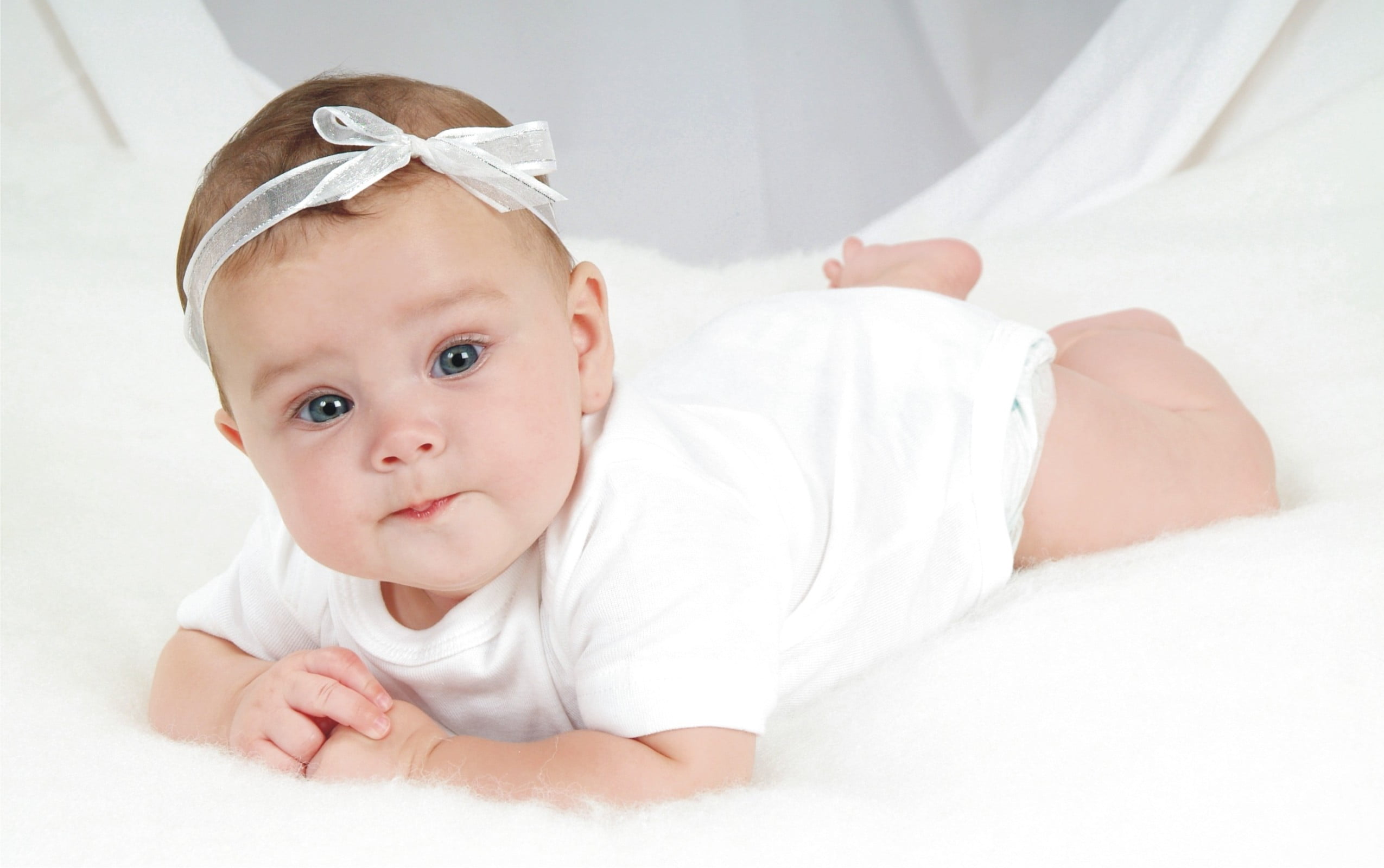 young, s, white color, sleeved, laying, innocence, 1080P, lying down, beginnings, portrait, cute, short, clothing, babyhood, indoors, onesie, one person, HD Wallpaper