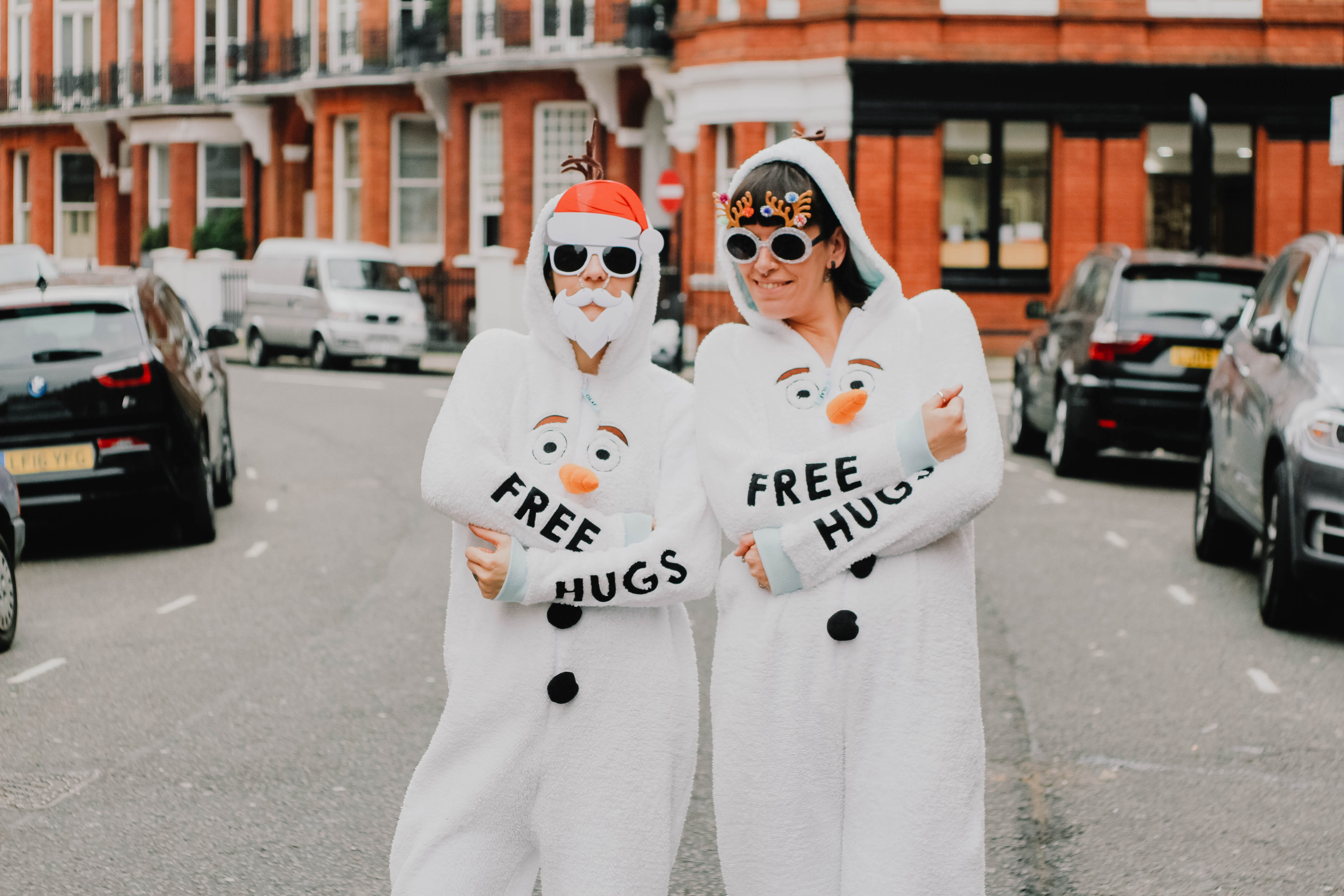 hugs, glasses, young adult, portrait, smiling, two, coveralls, festive, togetherness, next, looking at camera, christma, front view, city, 5K, two people, HD Wallpaper