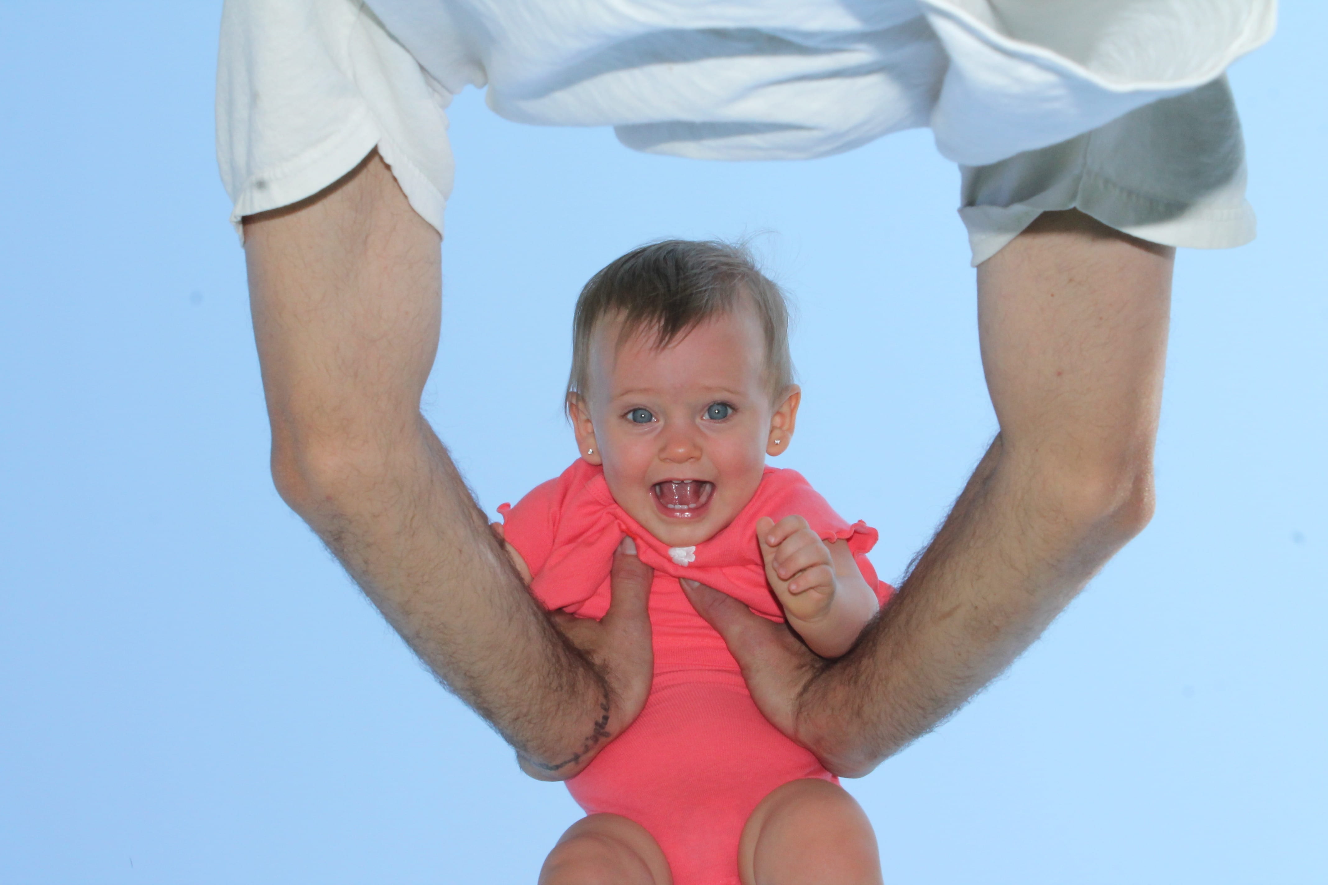 baby, arms raised, people, childhood, young, happy, innocence, family with one child, father, human arm, portrait, pink, adult, emotion, playing, family, HD Wallpaper