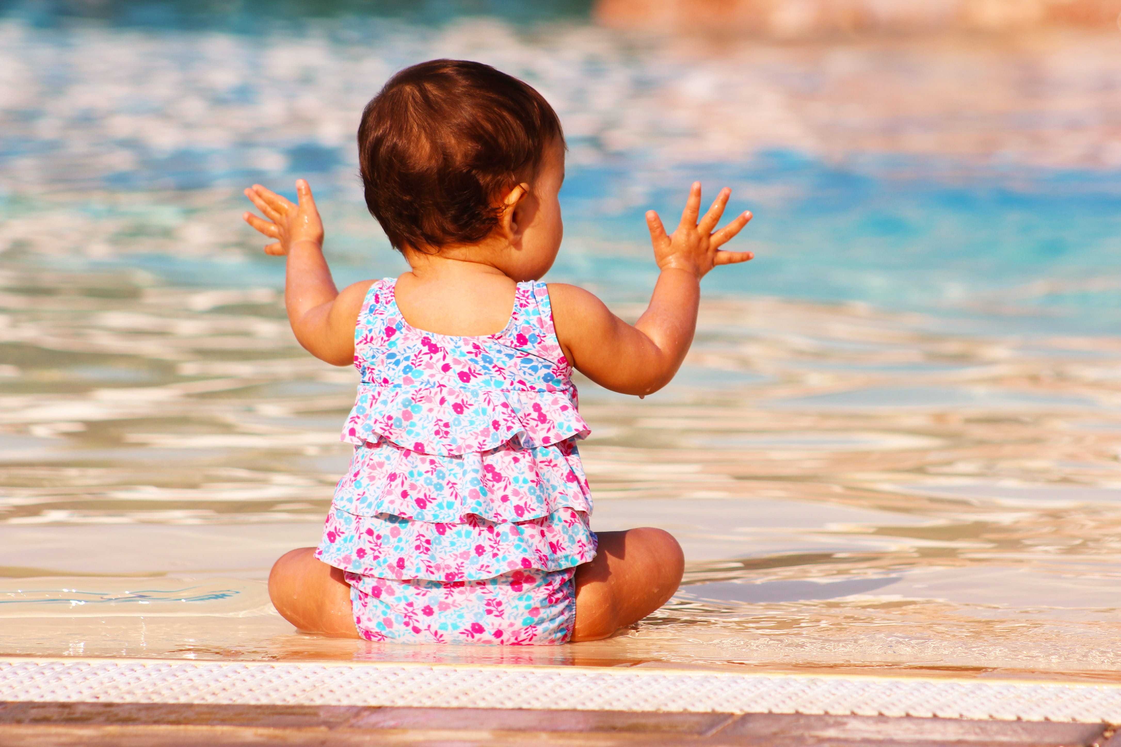 babyhood, young, childhood, innocence, sitting, joy, clap, water, human arm, 4K, girl, nature, beach, pink color, outdoor, swimming pool, baby, family, HD Wallpaper