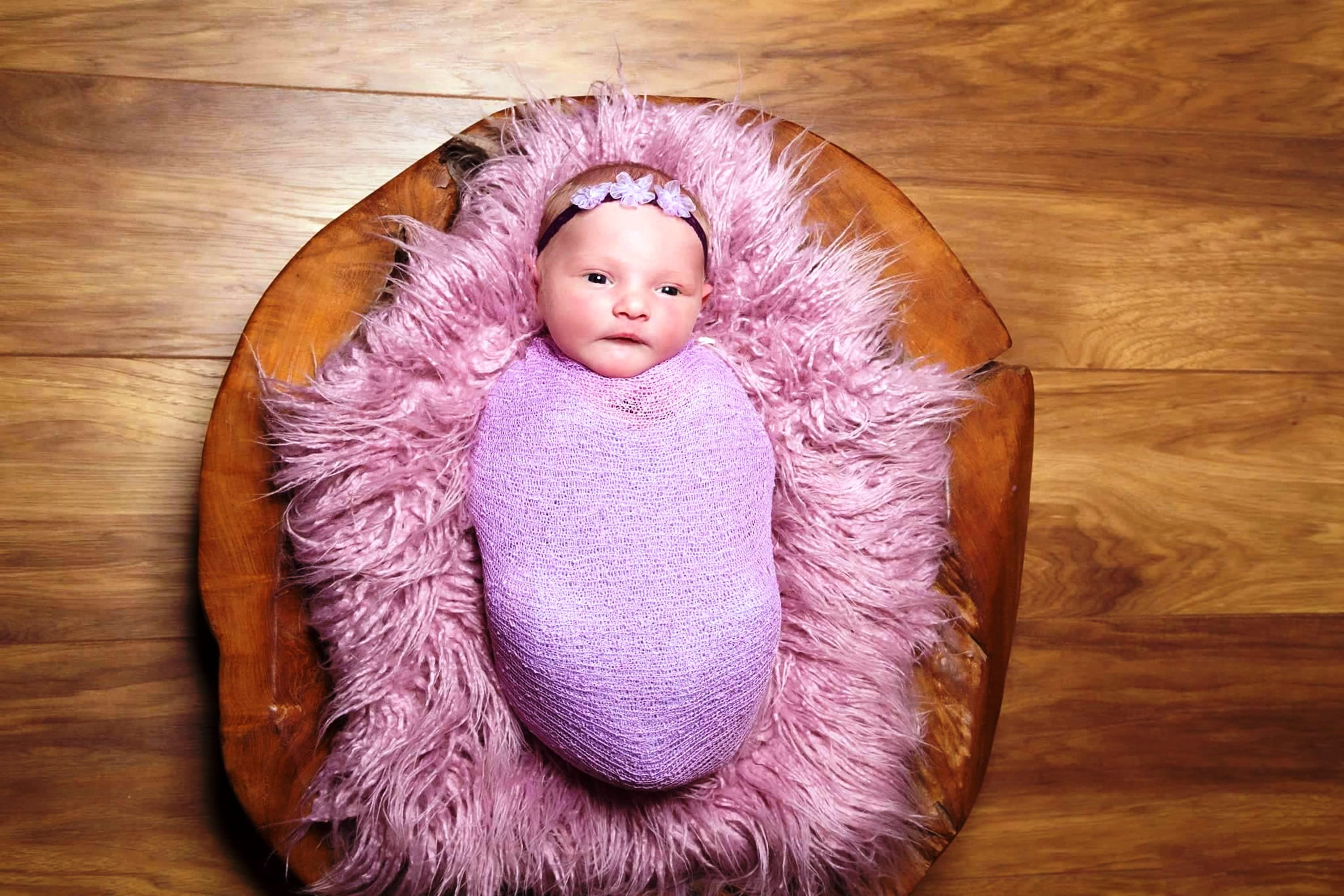softness, cute, newborn, high angle view, one person, wood, warm clothing, child, pink color, swaddling, fur, lying down, baby, childhood, innocence, 2K, HD Wallpaper