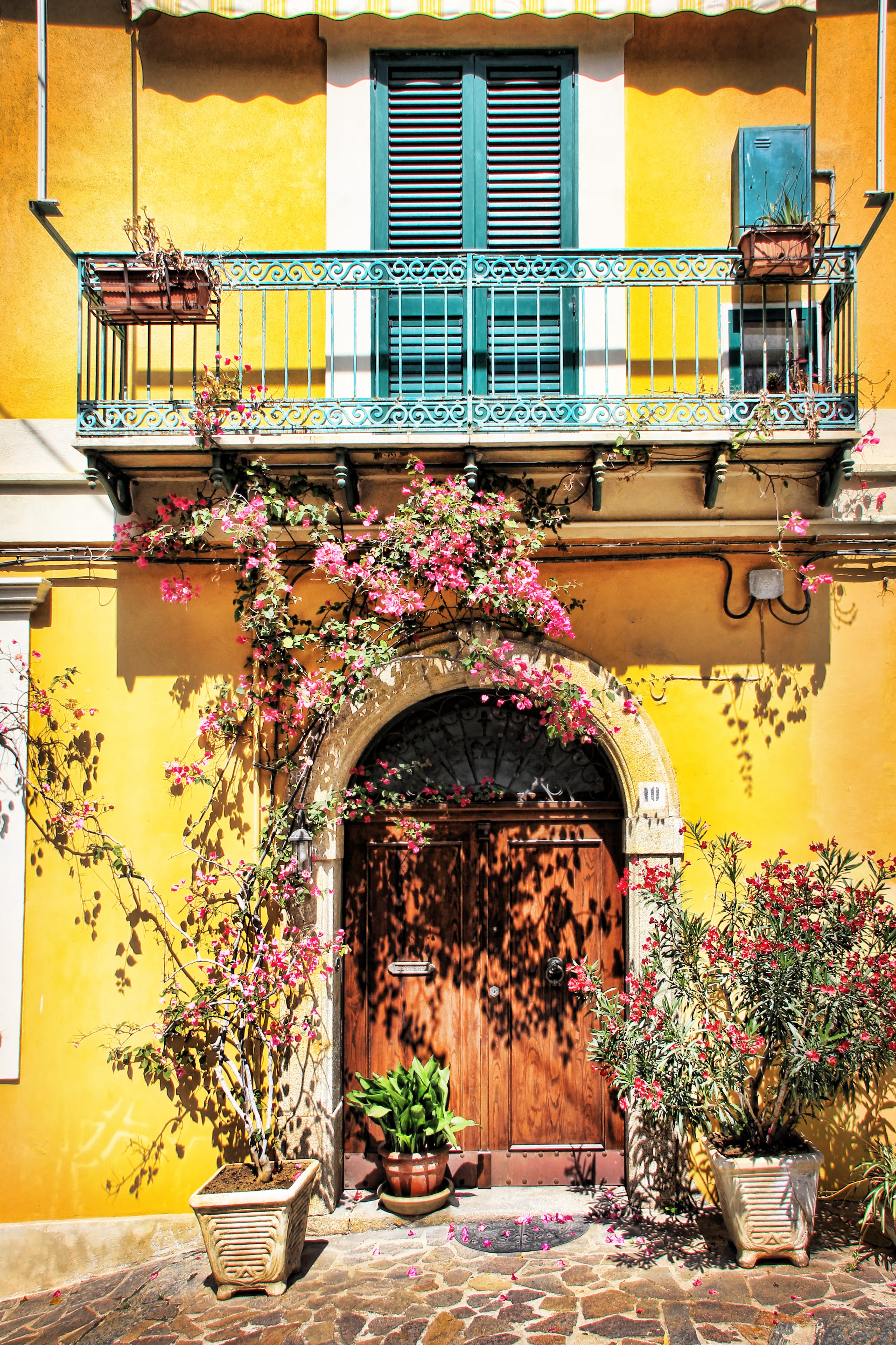 door, europe, facade, calabria, town, street, plant, 5K, city, yellow, balcony, day, potted plant, village, old, red, residential Building, residential district, Phone HD Wallpaper