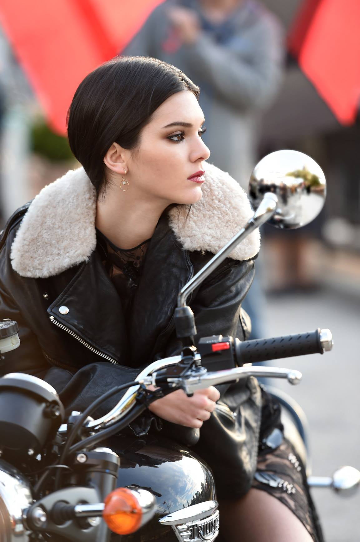 women, women with bikes, Kendall Jenner, brunette, sitting, looking into the distance, model, 720P, motorcycle, Phone HD Wallpaper