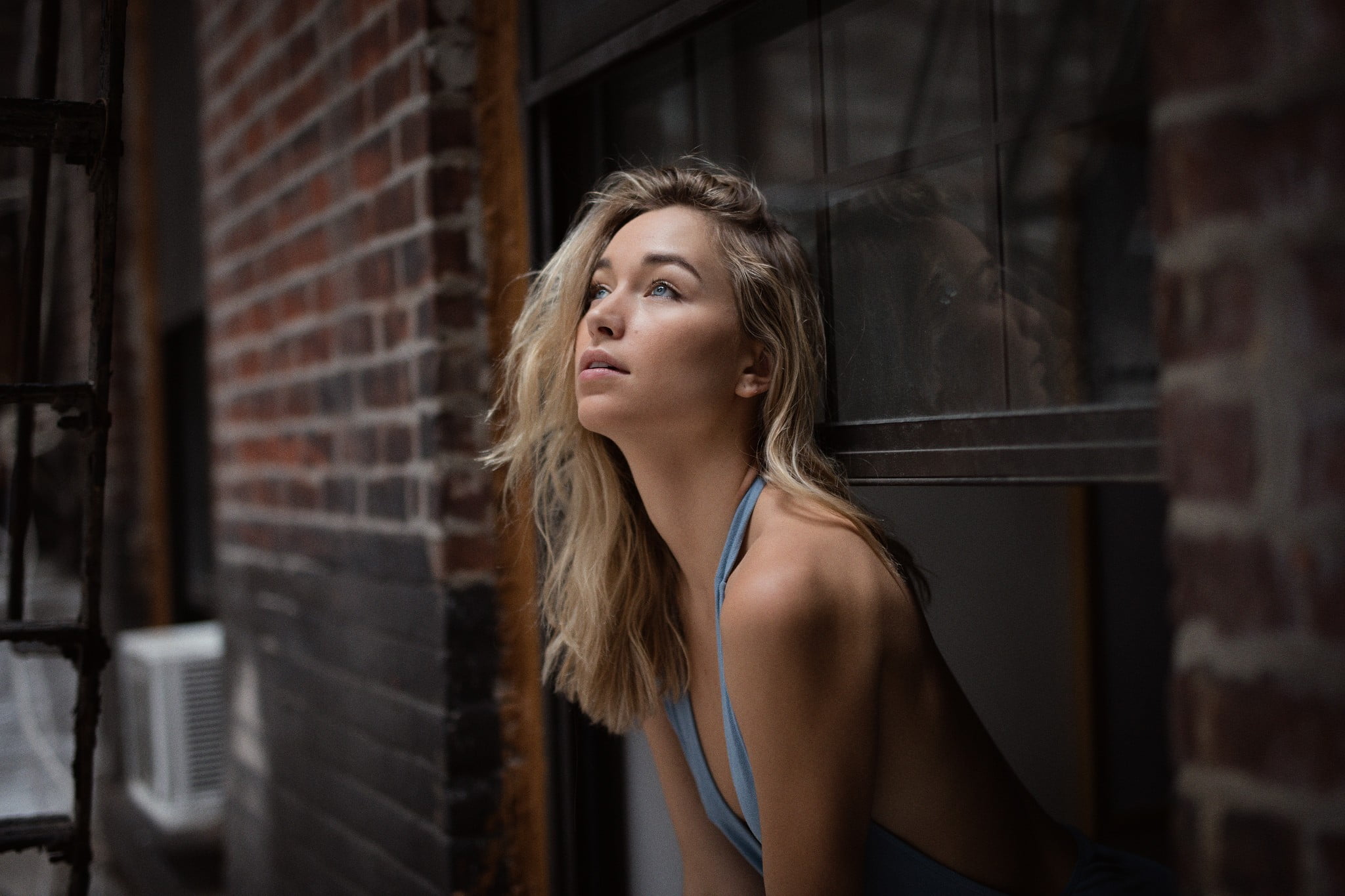 young adult, contemplation, brick, beautiful woman, young women, portrait, indoors, blonde, one person, looking into the distance, looking out window, looking away, HD Wallpaper