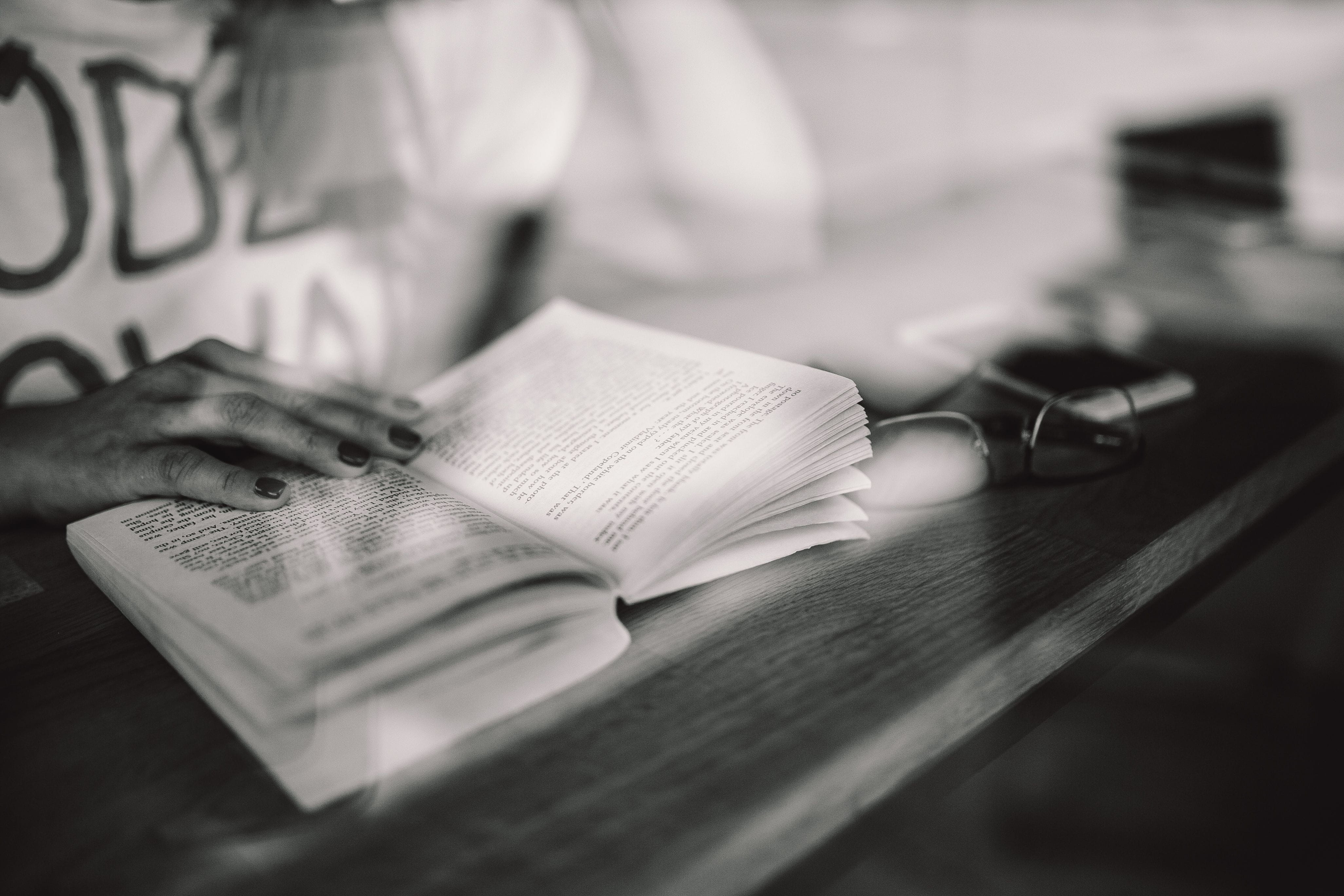 selective focus, black And White, woman, holding, cafe, table, hand, activity, human Hand, studying, indoors, shop, adults only, finance, Woman reading, HD Wallpaper
