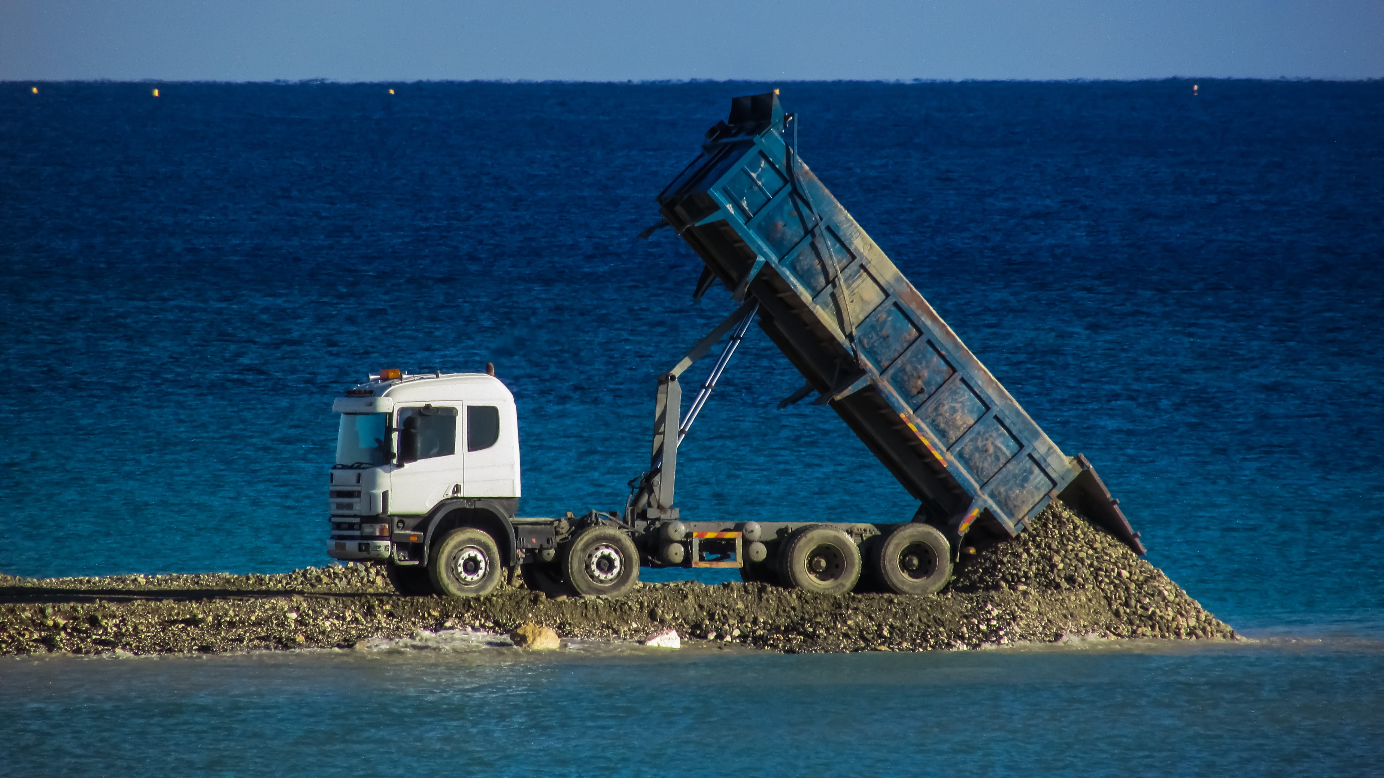 water, unload, motion, near, shipping, ayia napa, transportation, vehicle, embankment fill, no people, freight transportation, truck, nature, blue, dumping, HD Wallpaper