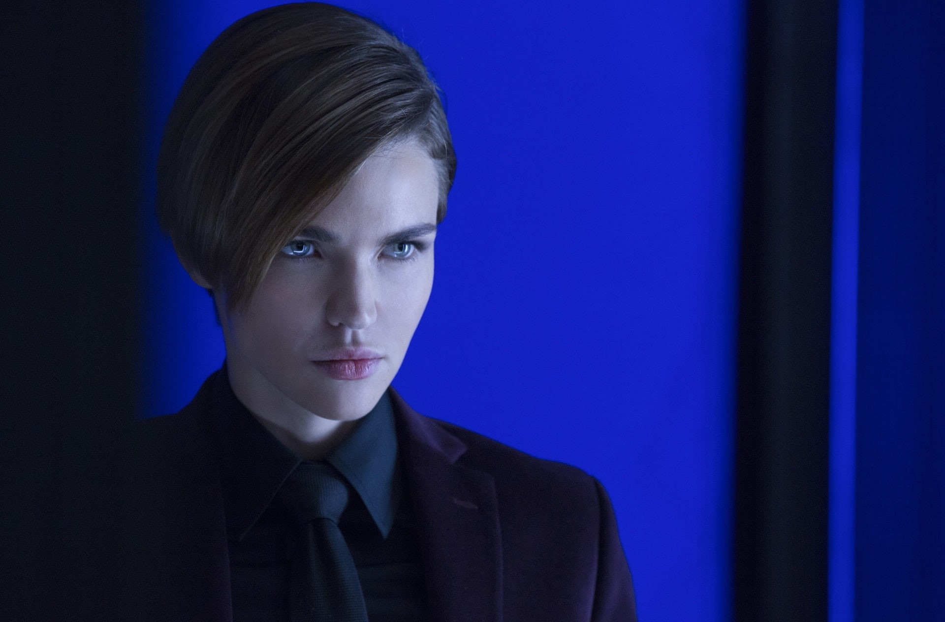 women, headshot, well-dressed, blue background, looking at camera, one person, hairstyle, suit, young adult, john wick chapter two high definition  widescreen, HD Wallpaper