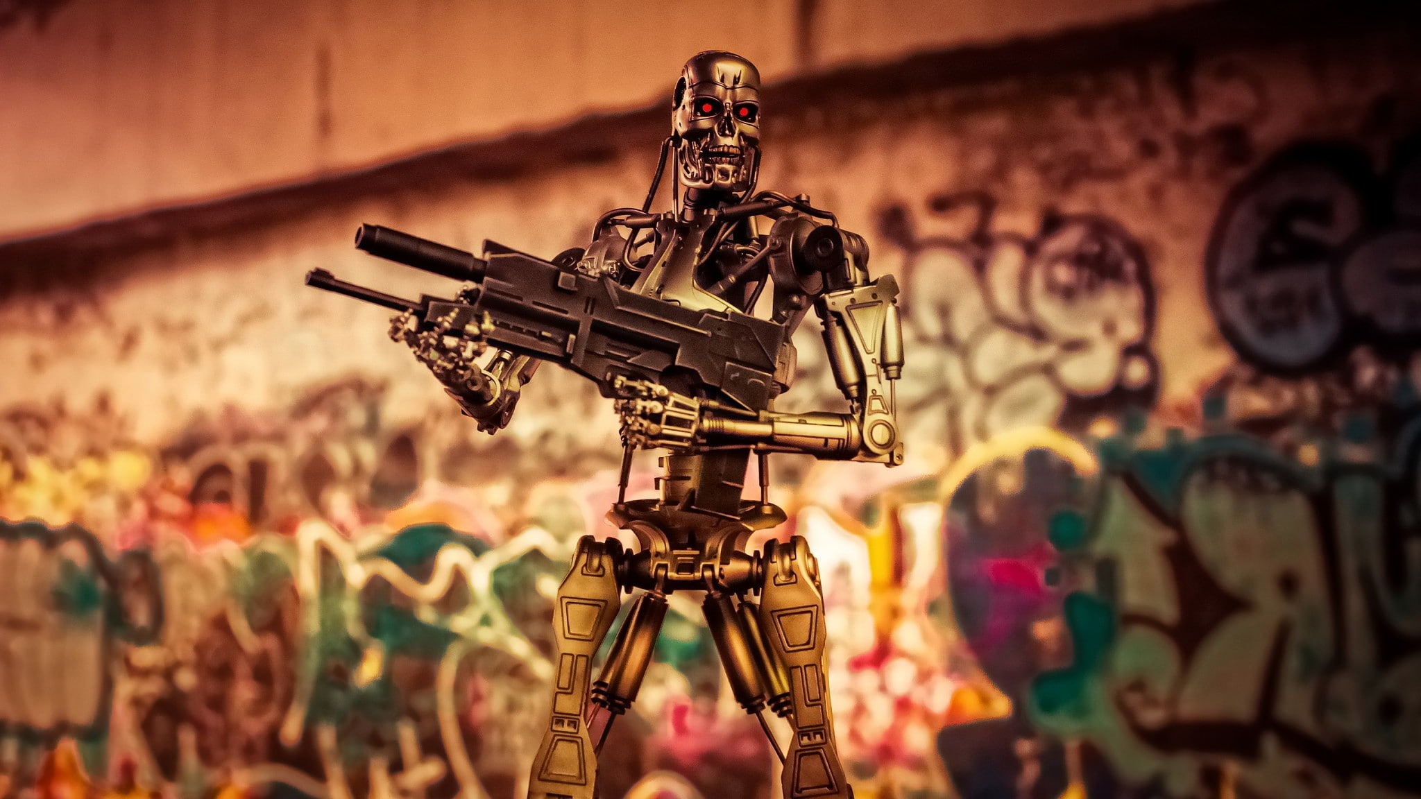photography themes, graffiti, machinery, Terminator, wall - building feature, architecture, focus on foreground, no people, human representation, indoors, HD Wallpaper