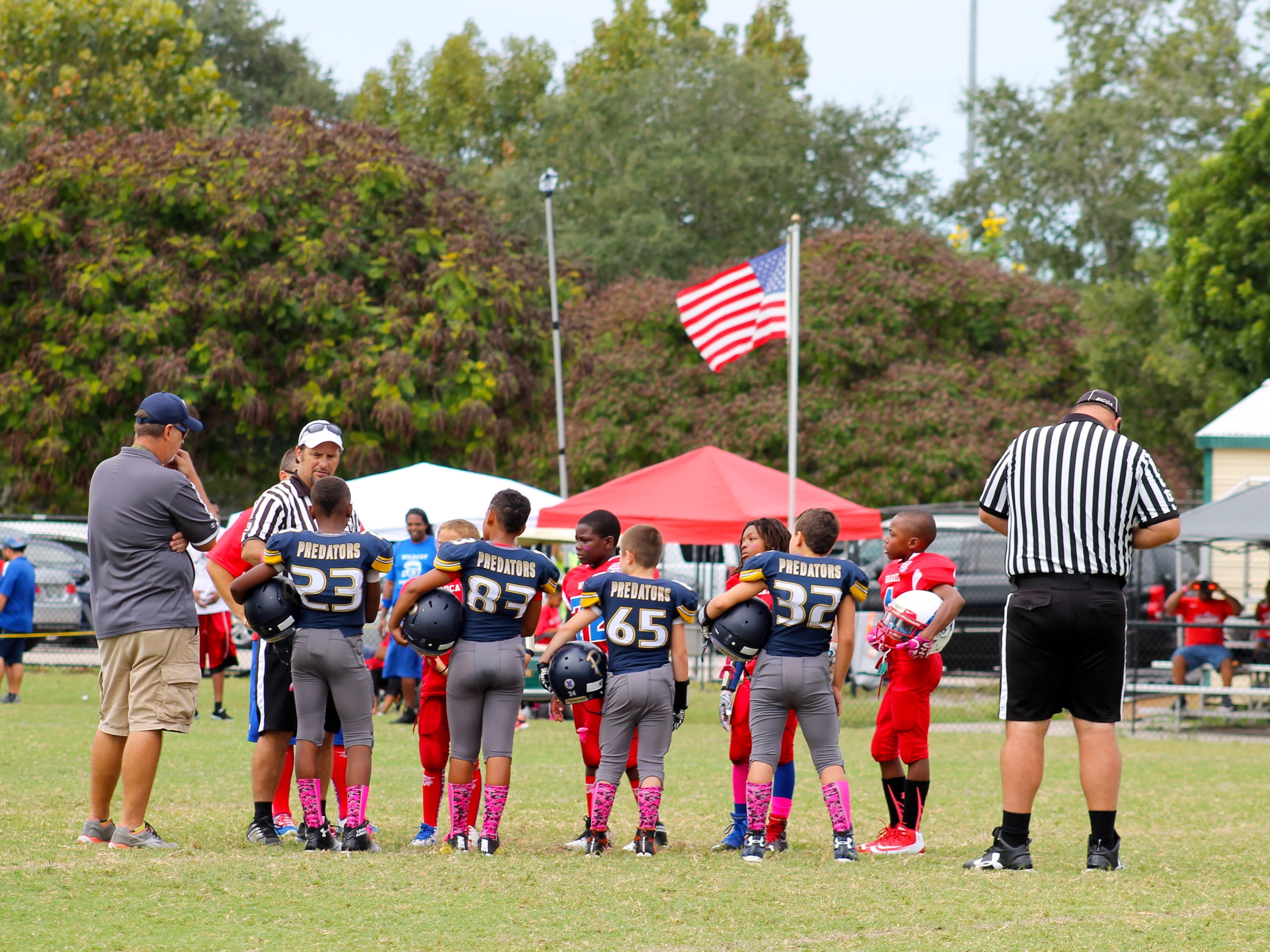 crowd, adult, standing, mature adult, young, full length, youth, real people, athletic, teammates, outdoors, boy, patriotism, kid, Pee Wee Football, sport, HD Wallpaper