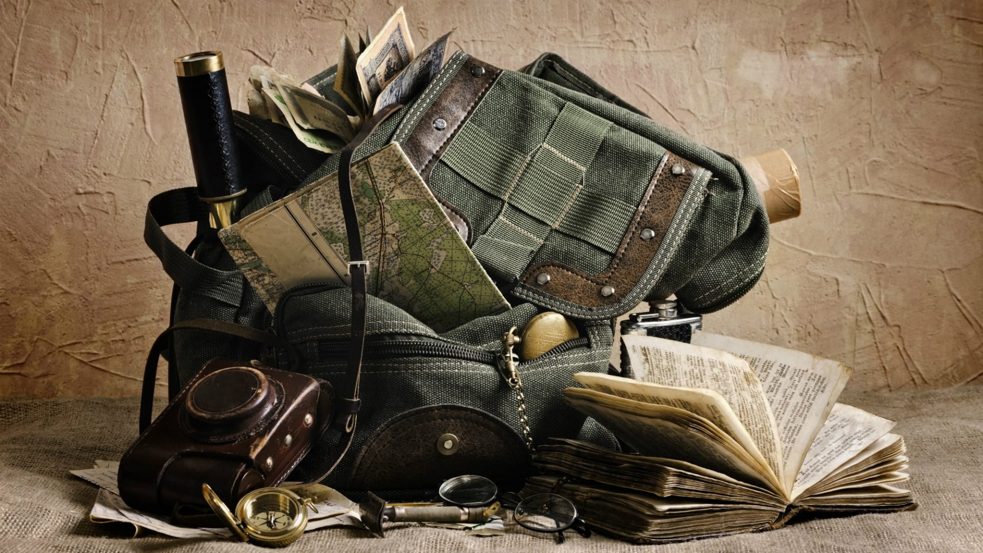 damaged, books, table, green, bag, high angle view, 1080P, clothing, duffel, paper, publication, map, antique, old, adventurers, obsolete, book, indoors, HD Wallpaper