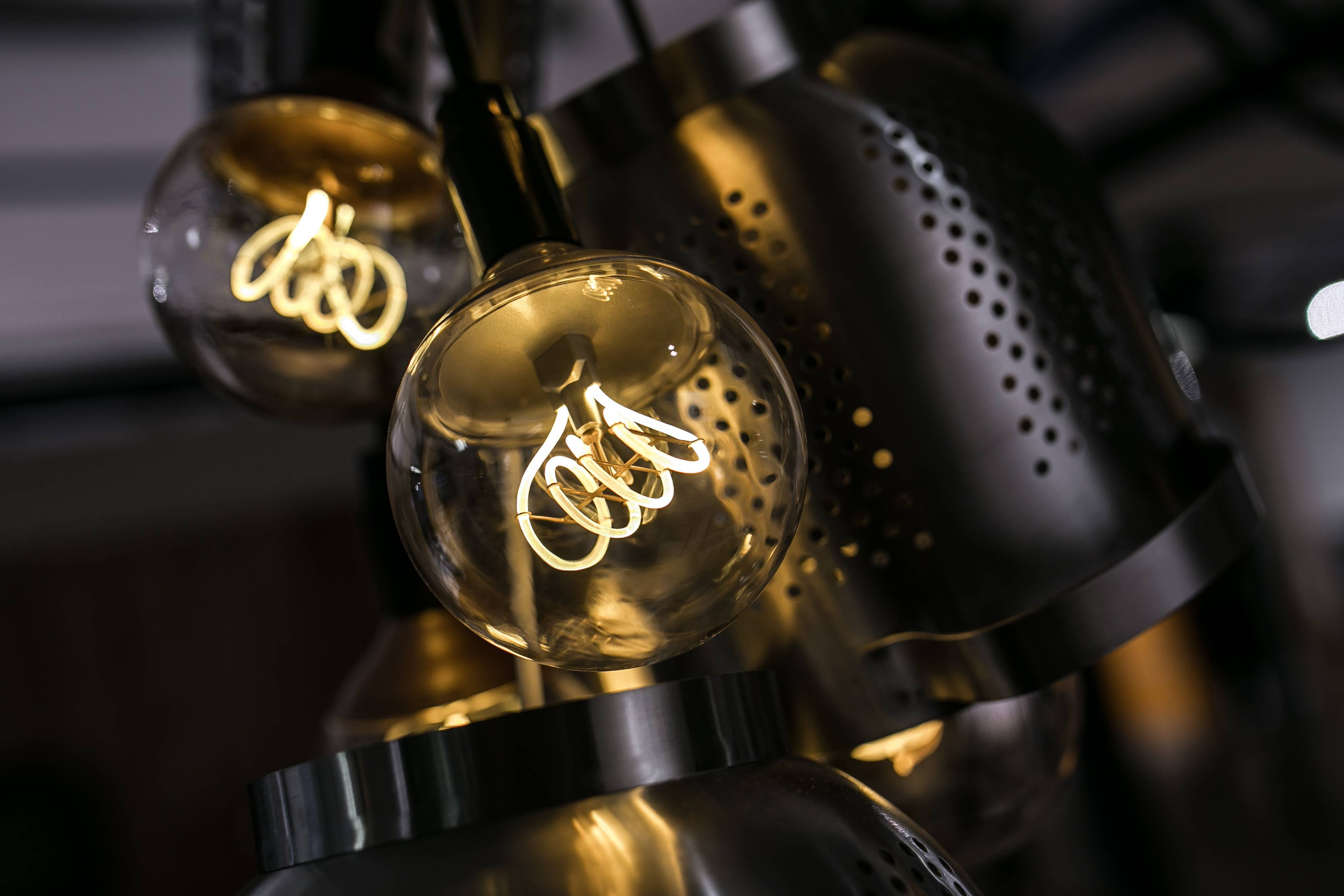 gold colored, metal, store, history, shiny, close-up, indoors, bright, no people, light, circle, lightbulbs, transportation, the past, electric, giving, HD Wallpaper