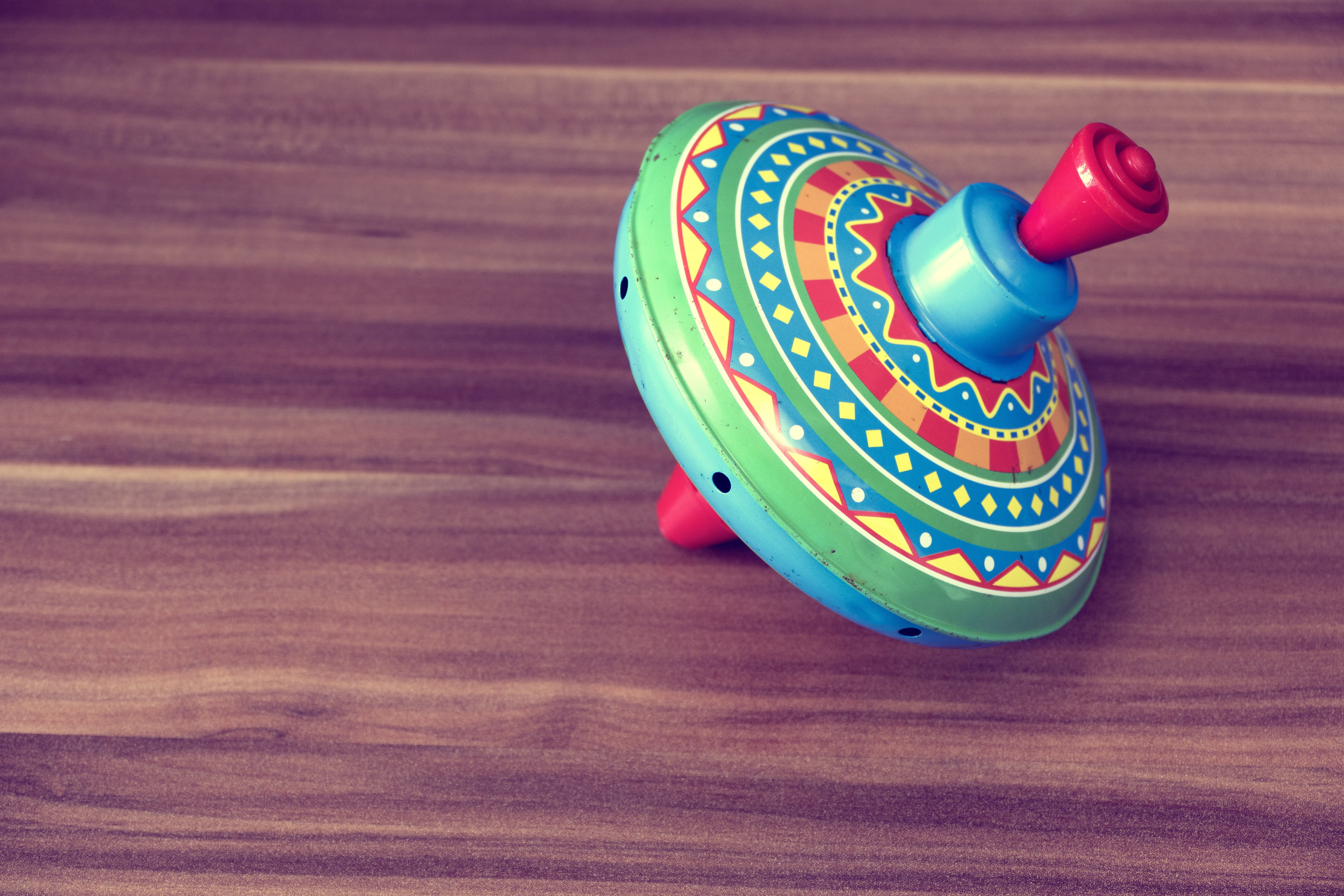 wooden, plastic, indoors, 5K, retro, colours, toys, colourful, round, spinning top, fun, candy, pink color, animal representation, multicolored, studio shot, HD Wallpaper