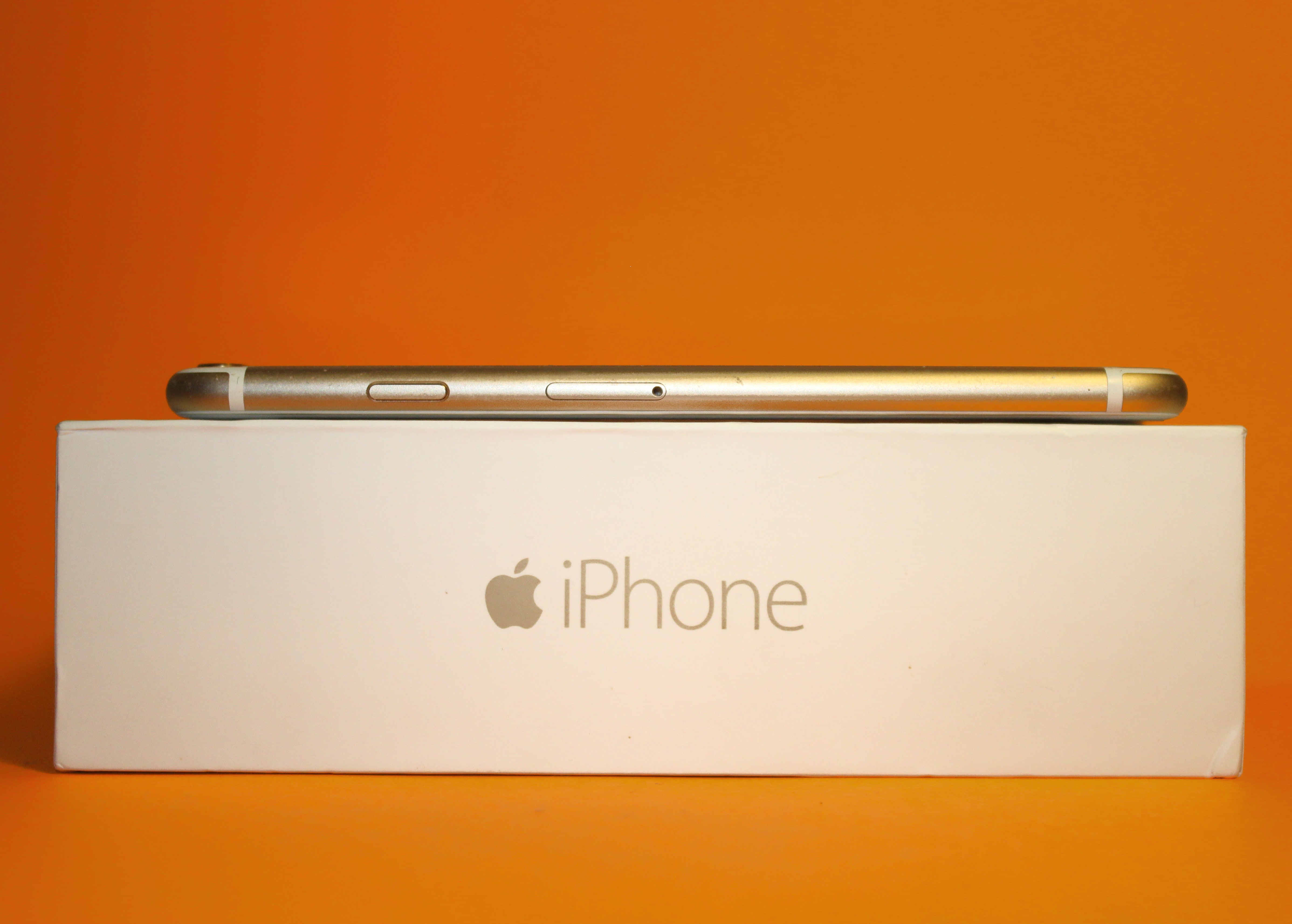 iPhone, copy space, studio shot, close-up, phone, technology, orange color, smartphone, text, western script, single object, orange, 4K, sign, blank, colored background, HD Wallpaper