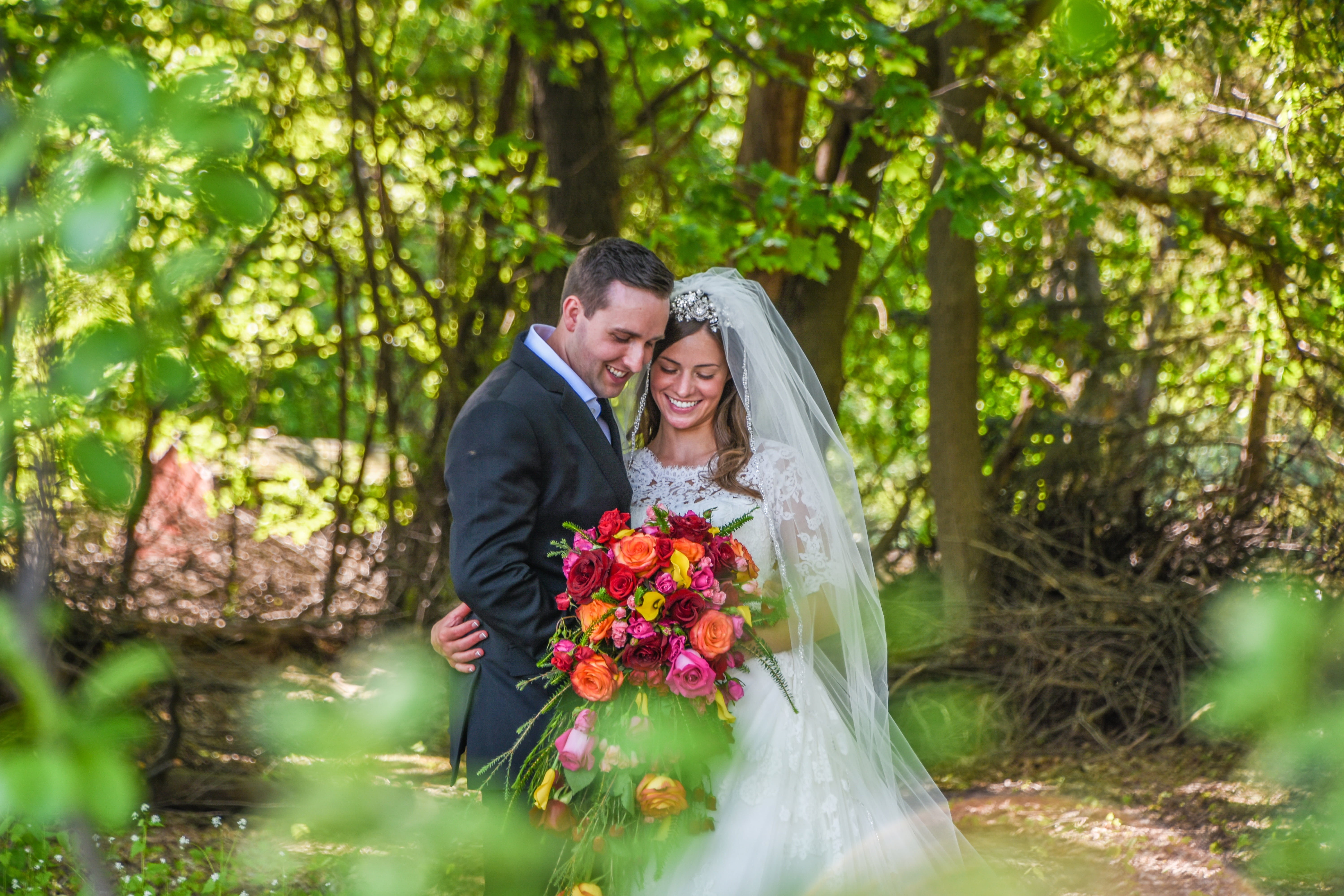 marriage, outdoor, nature, flower, green, bride, emotion, veil, happiness, wedding, men, middle, hug, forest, married, groom, suit, positive emotion, smiling, HD Wallpaper