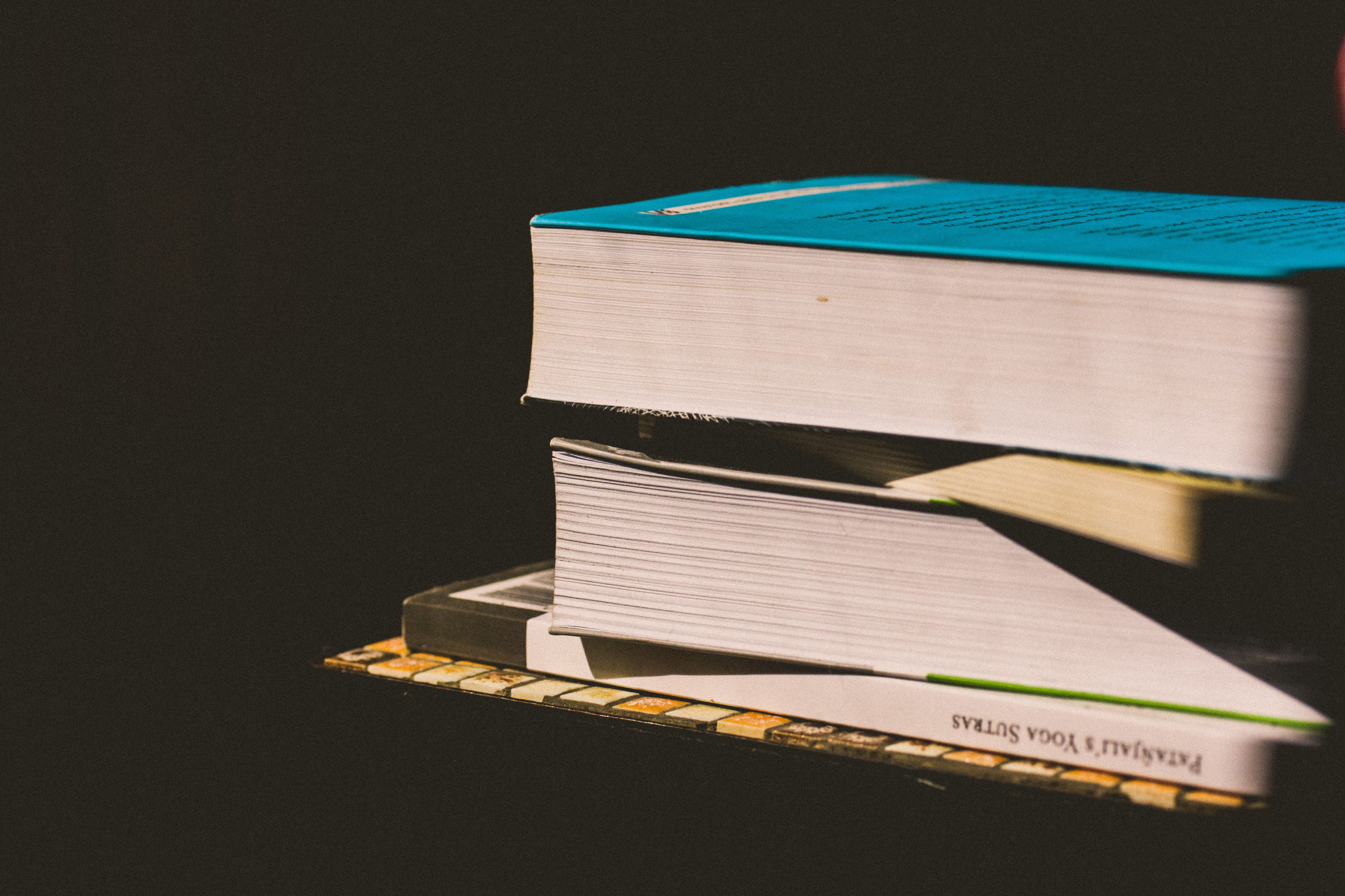 publication, indoors, reading, copy space, background, stack, sky, Books, various, still life, student, learning, architecture, old, studio shot, black background, HD Wallpaper