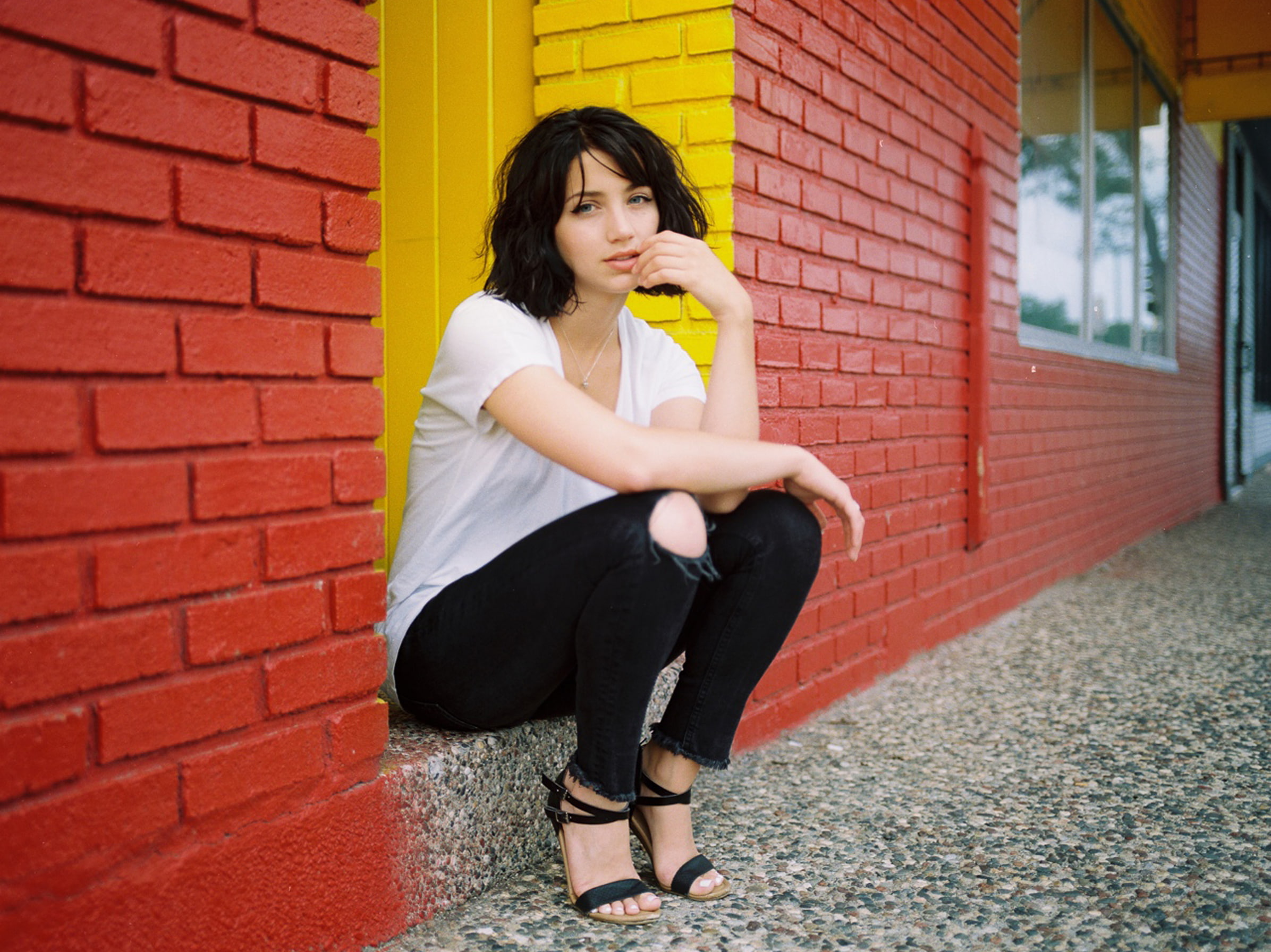 young adult, one person, shirt, built structure, s, 1080P, sleeved, architecture, brick wall, building exterior, real people, Emily Rudd, brick, young women, HD Wallpaper