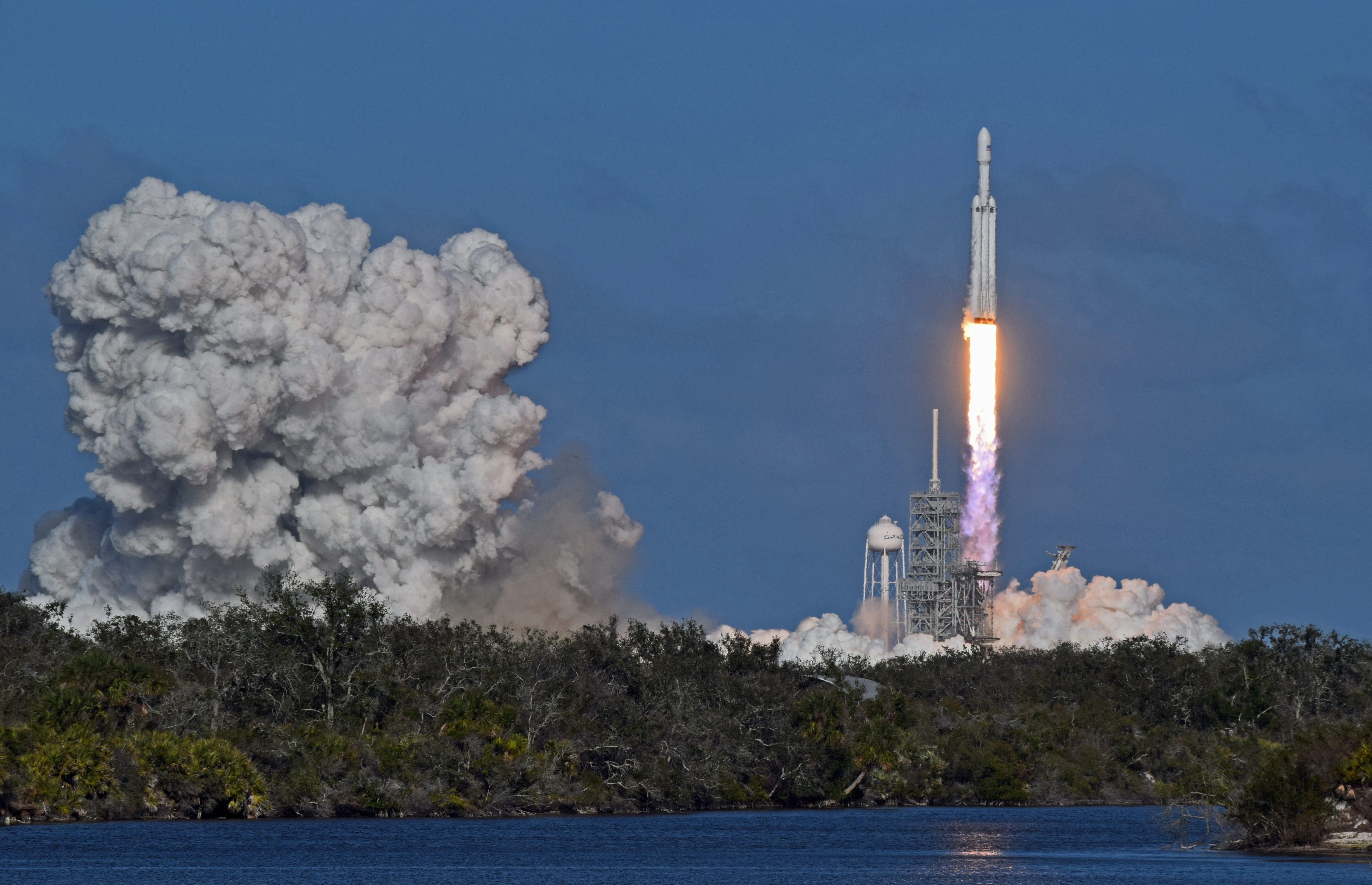 land, 4K, no people, sky, architecture, air pollution, building, exploding, tower, building exterior, falcon heavy, launch, nature, mountain, smoke - physical structure, HD Wallpaper