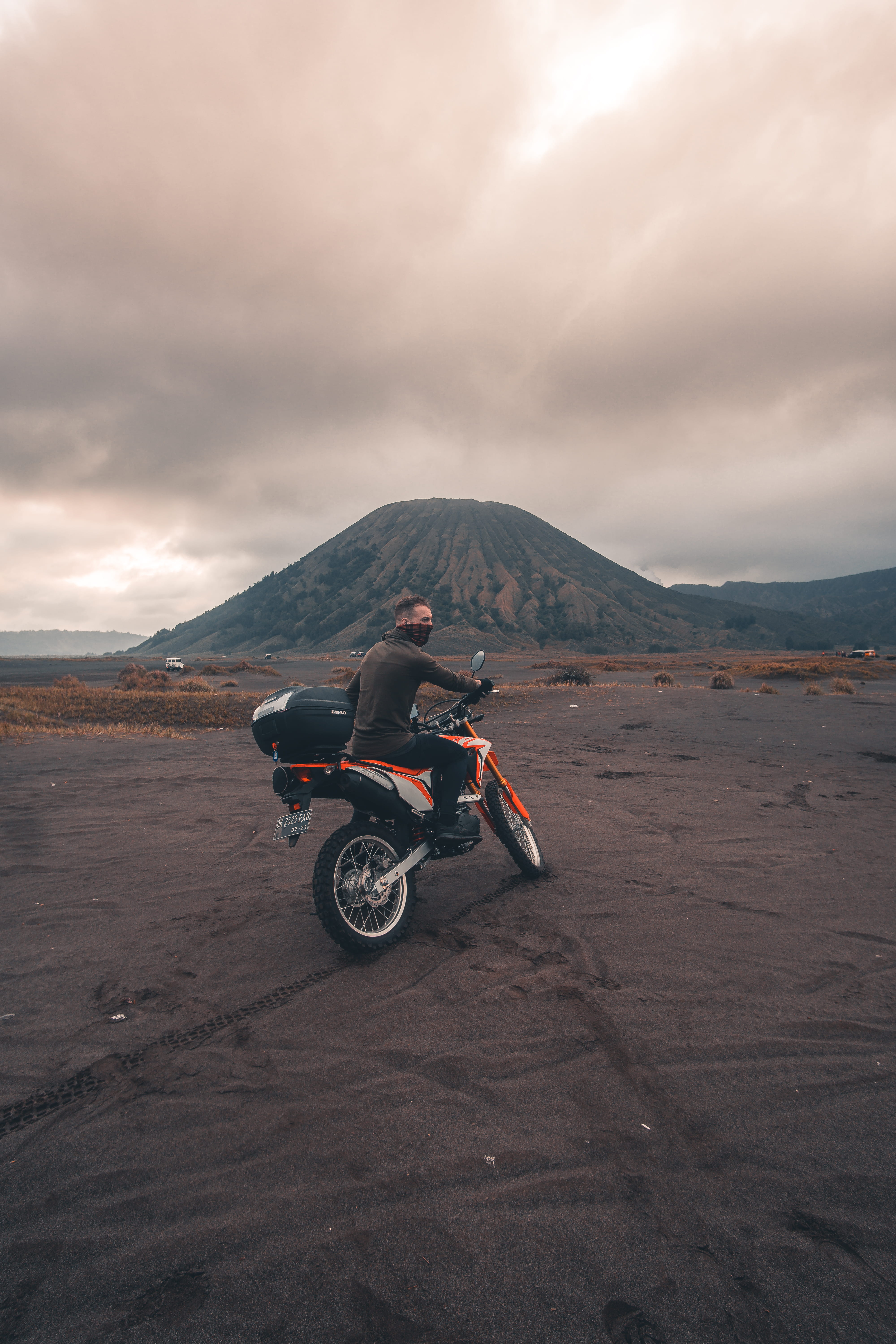 indonesia, cloud - sky, transportation, java, one person, mt bromo, full length, outdoors, 5K, crash helmet, land vehicle, vehicle, sky, orange, man, mountain, Phone HD Wallpaper