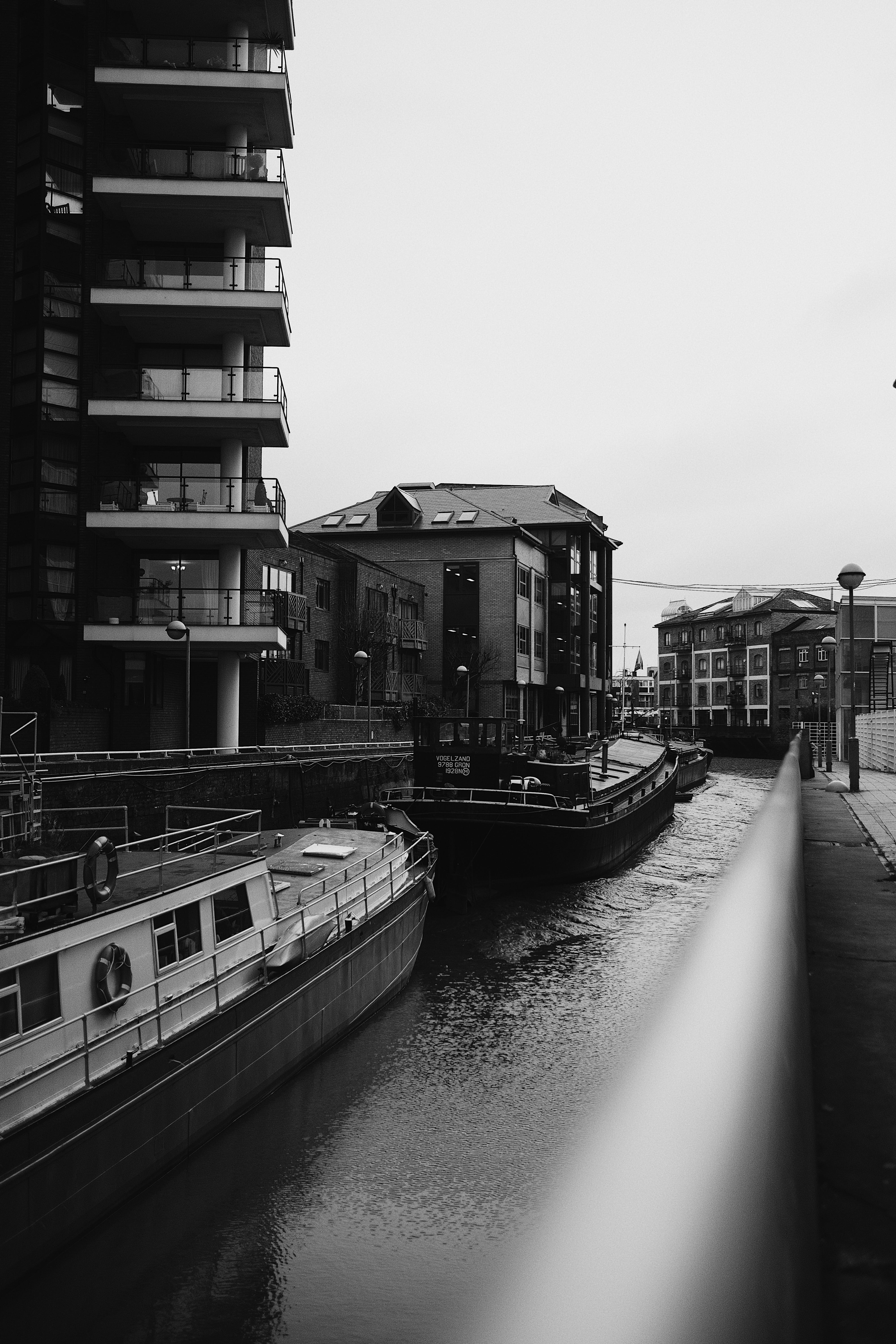 sky, building, monochrome, no people, waterfront, river thames, built structure, ships, water, building exterior, flats, grey, focus, london, nautical vessel, Phone HD Wallpaper