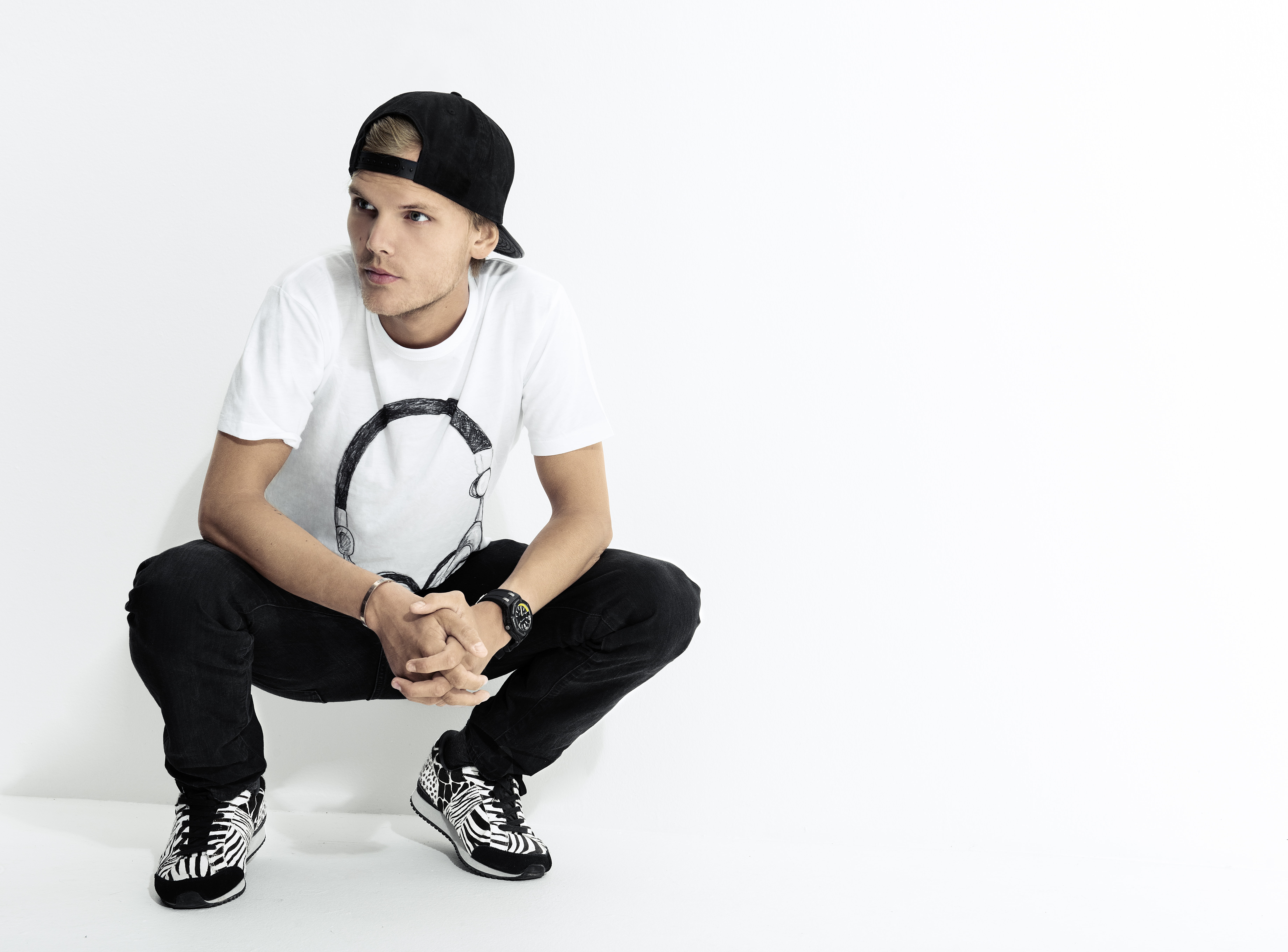 clothing, young adult, music, cap, 5k, front view, artist, full length, 5K, avicii, portrait, copy space, leisure activity, shoe, sitting, one person, HD Wallpaper