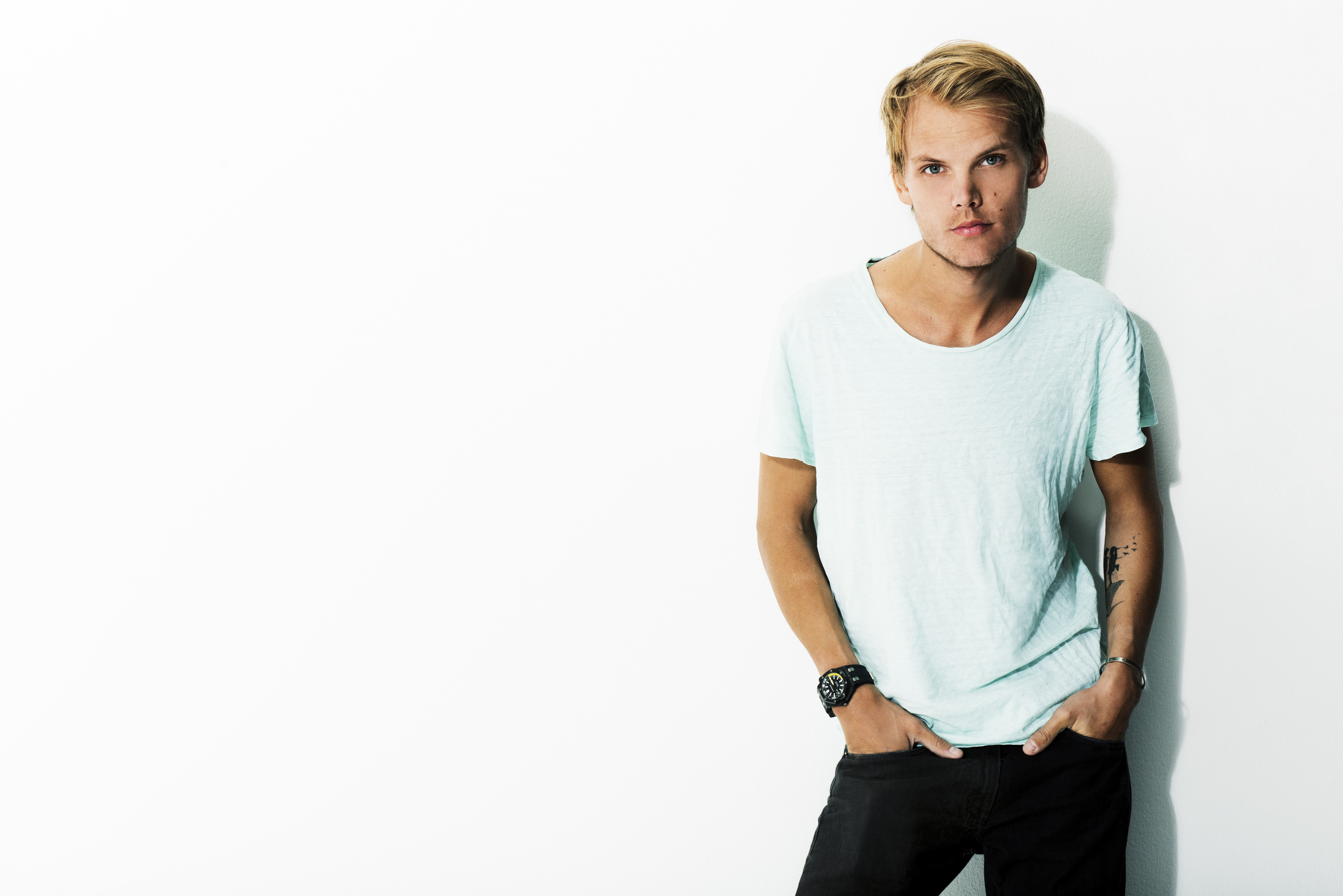 white background, front view, hands in pockets, music, three quarter length, looking at camera, one person, Avicii, standing, hairstyle, young adult, copy space, HD Wallpaper