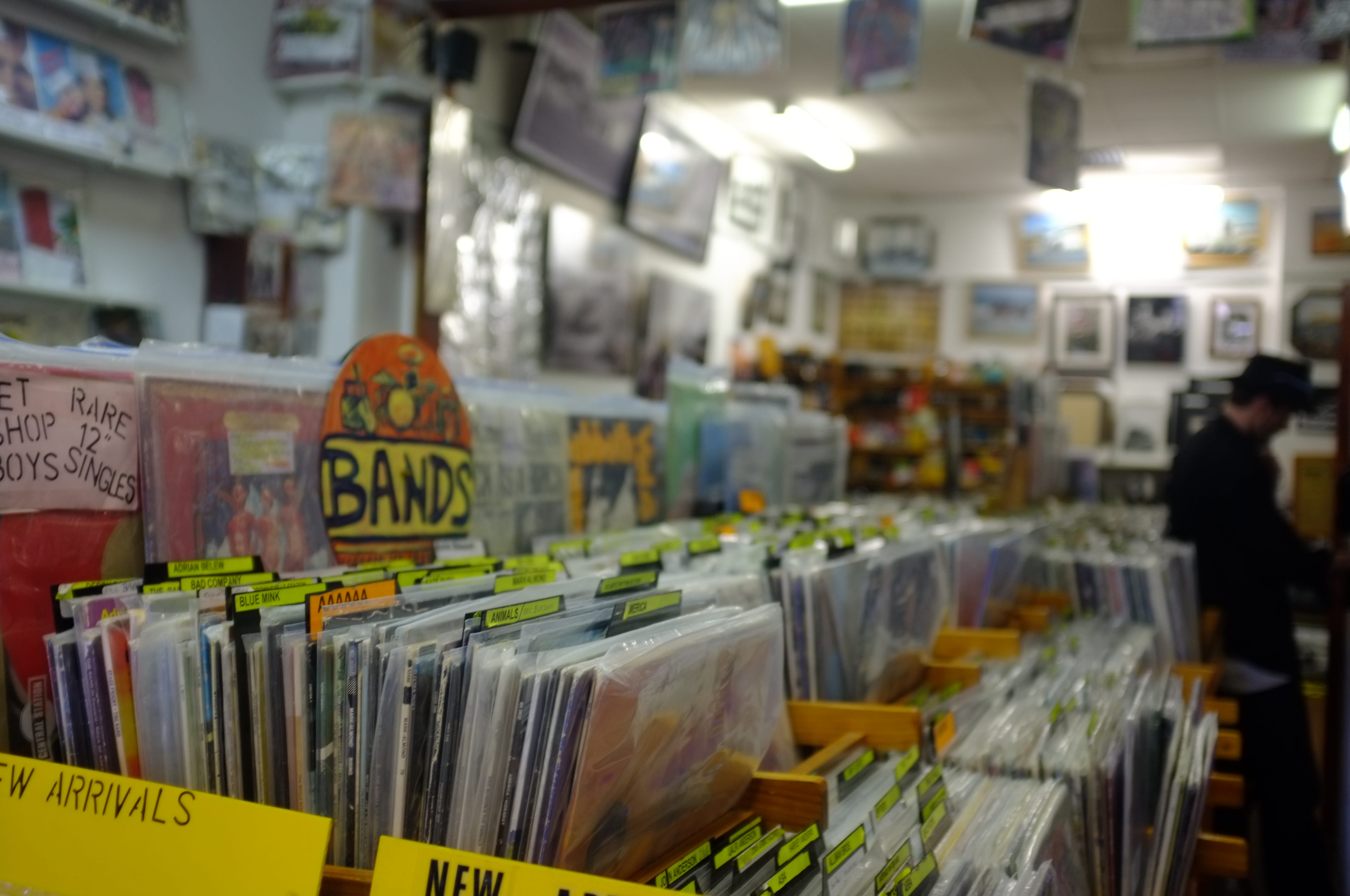 4K, variation, focus on foreground, text, retail, books, stand, for sale, bookstore, indoors, communication, business, vinyl store, incidental people, HD Wallpaper