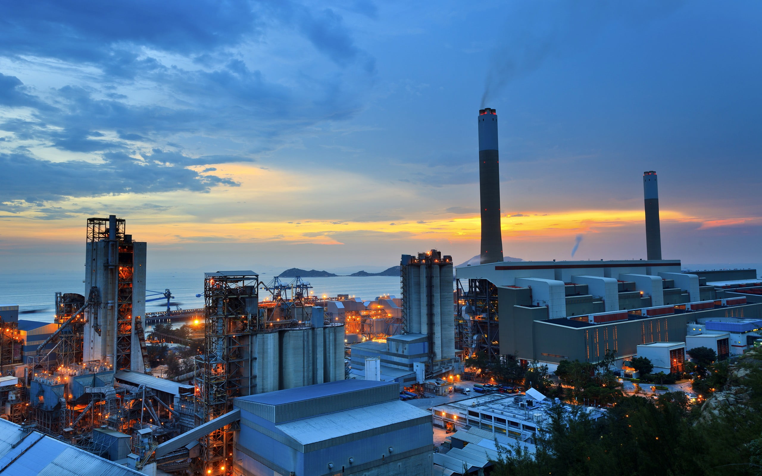 cityscape, smoke stack, industrial building, 2K, illuminated, gray, sunset, tower, cloud - sky, city, factory, no people, fuel and power generation, office building exterior, HD Wallpaper