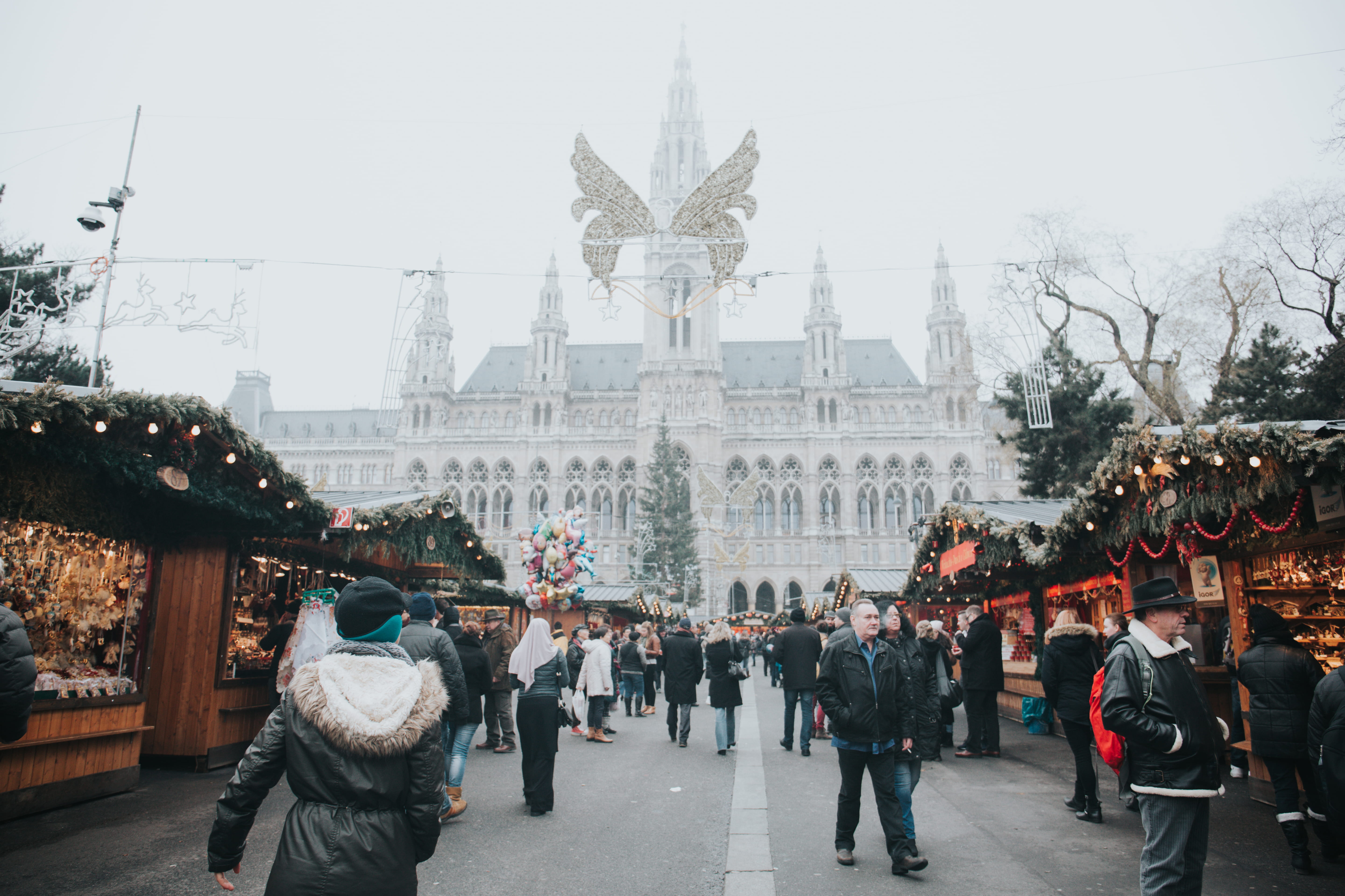 lifestyles, travel destinations, front, real people, winter, city, building exterior, person, christma, urban, christmas, stall, market, building, sky, HD Wallpaper