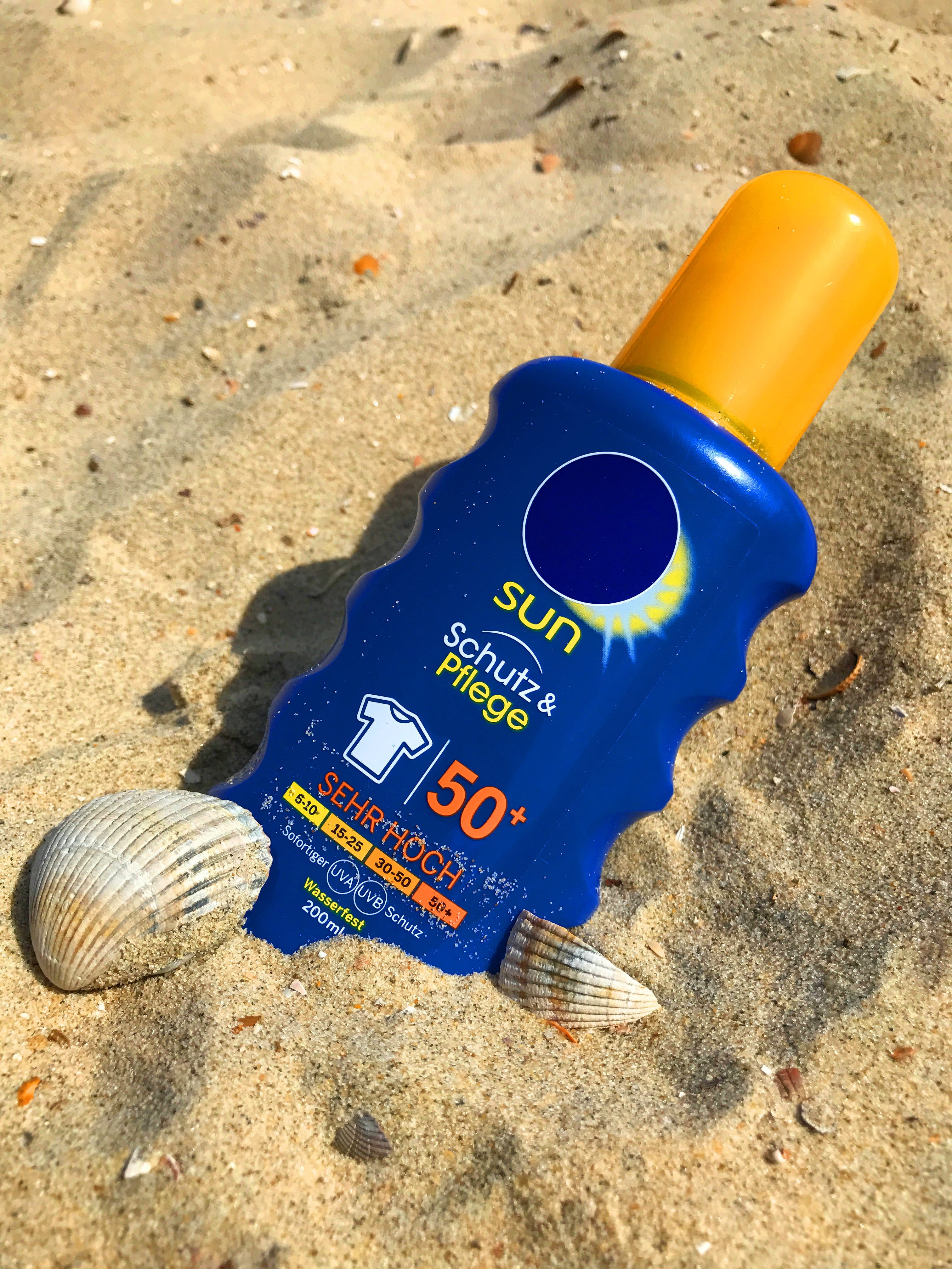 Milk, plastic, high angle view, bottle, Sunscreen, day, no people, sunlight, Beach, nature, sand, land, water, blue, 4K, still life, summer, yellow, close-up, Phone HD Wallpaper