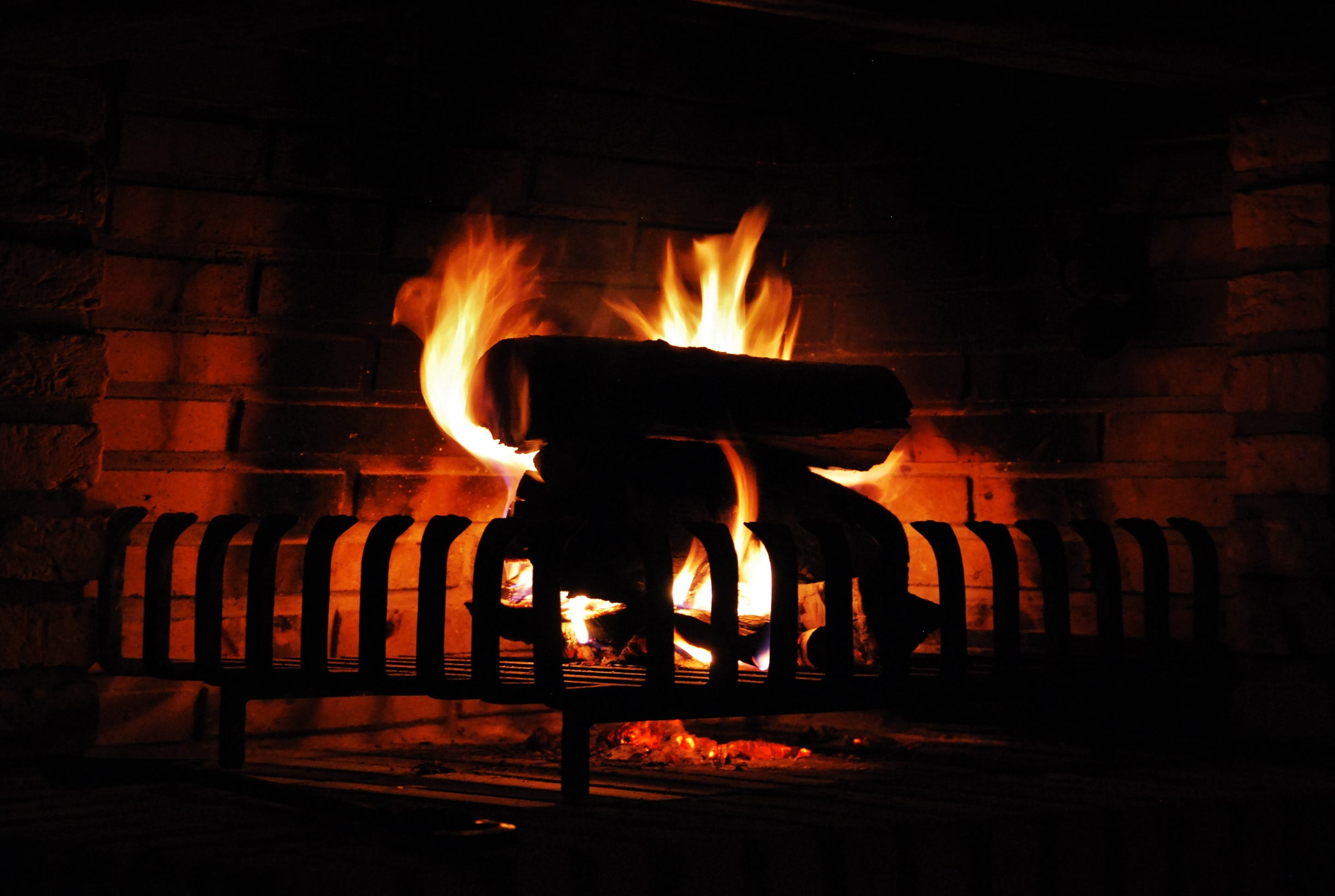 indoors, orange color, wood for the fireplace, flame, brick, embers, Fire, no people, fire, Warm, Cozy, wall, firewood, nature, motion, log, wood fire, HD Wallpaper