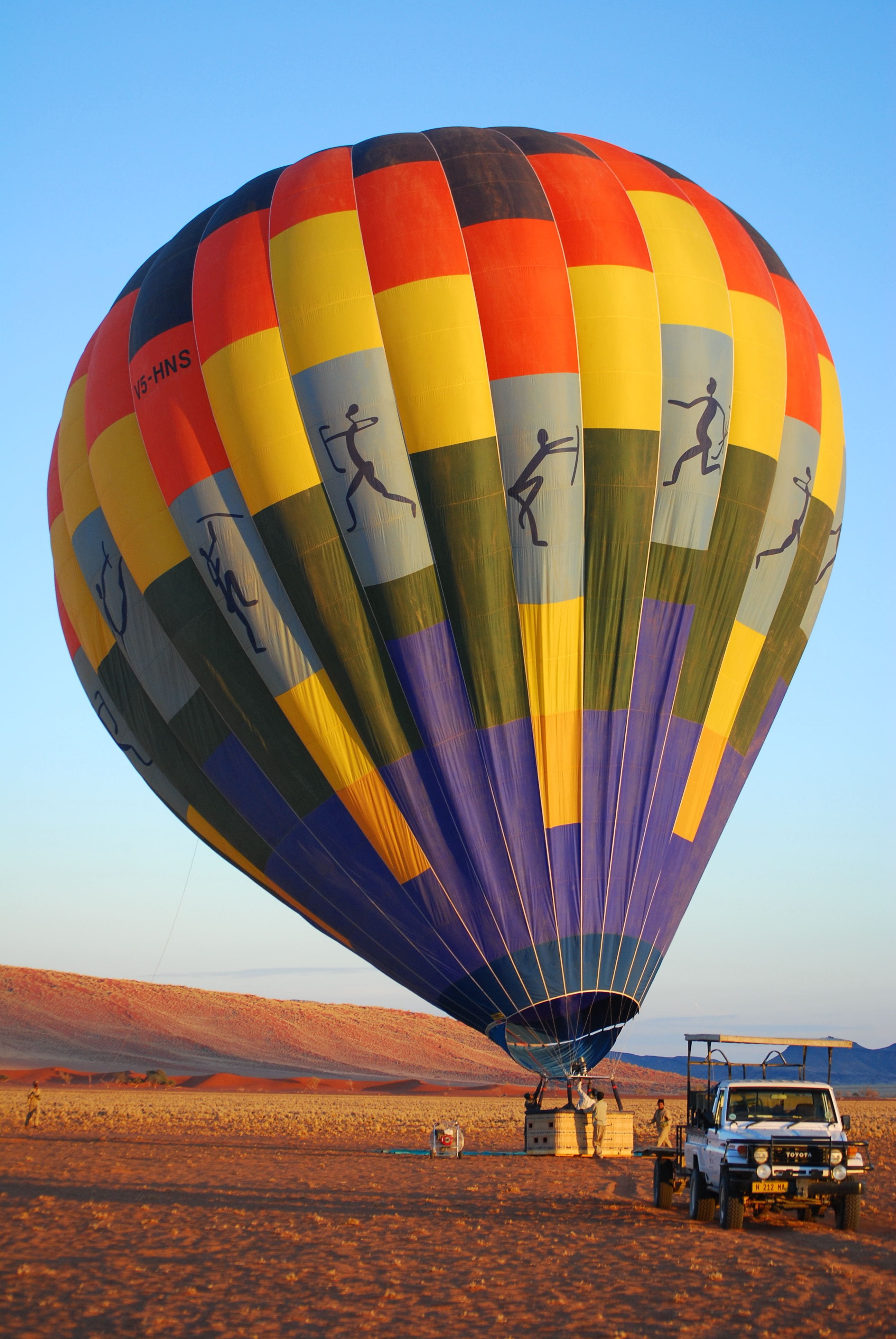 flying, nature, multi colored, day, namibia, transportation, hot air balloon, sky, air vehicle, environment, clear sky, namib, field, mode of transportation, Phone HD Wallpaper