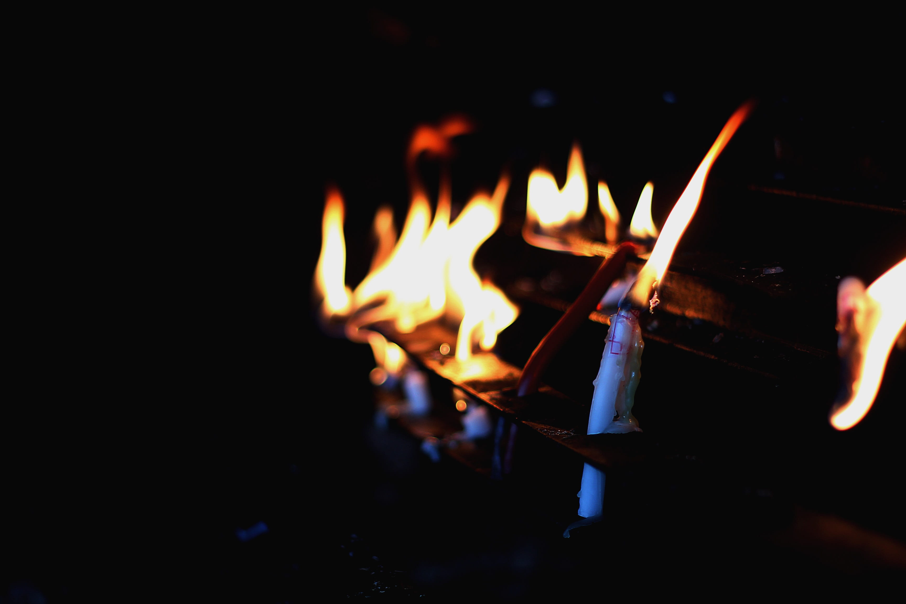 one person, close-up, burning, church, peace, motion, dark, spirituality, unrecognizable person, human hand, human body part, glow, light, heat, flame, HD Wallpaper