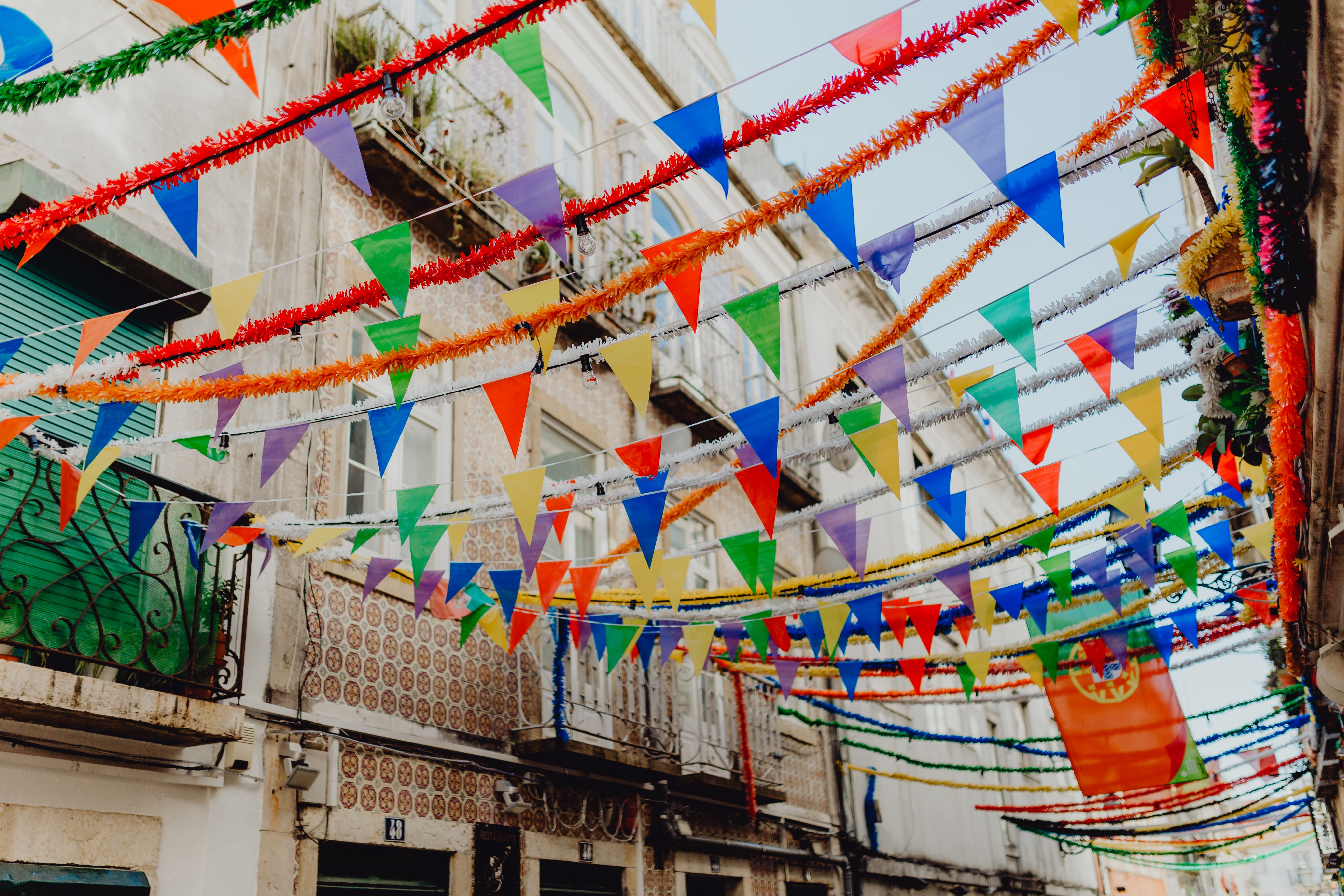 Saint Anthony, garland, santo antonio, multi colored, day, wind, 5K, religion, building, nature, hanging, no people, travel, town, built structure, anthony, HD Wallpaper