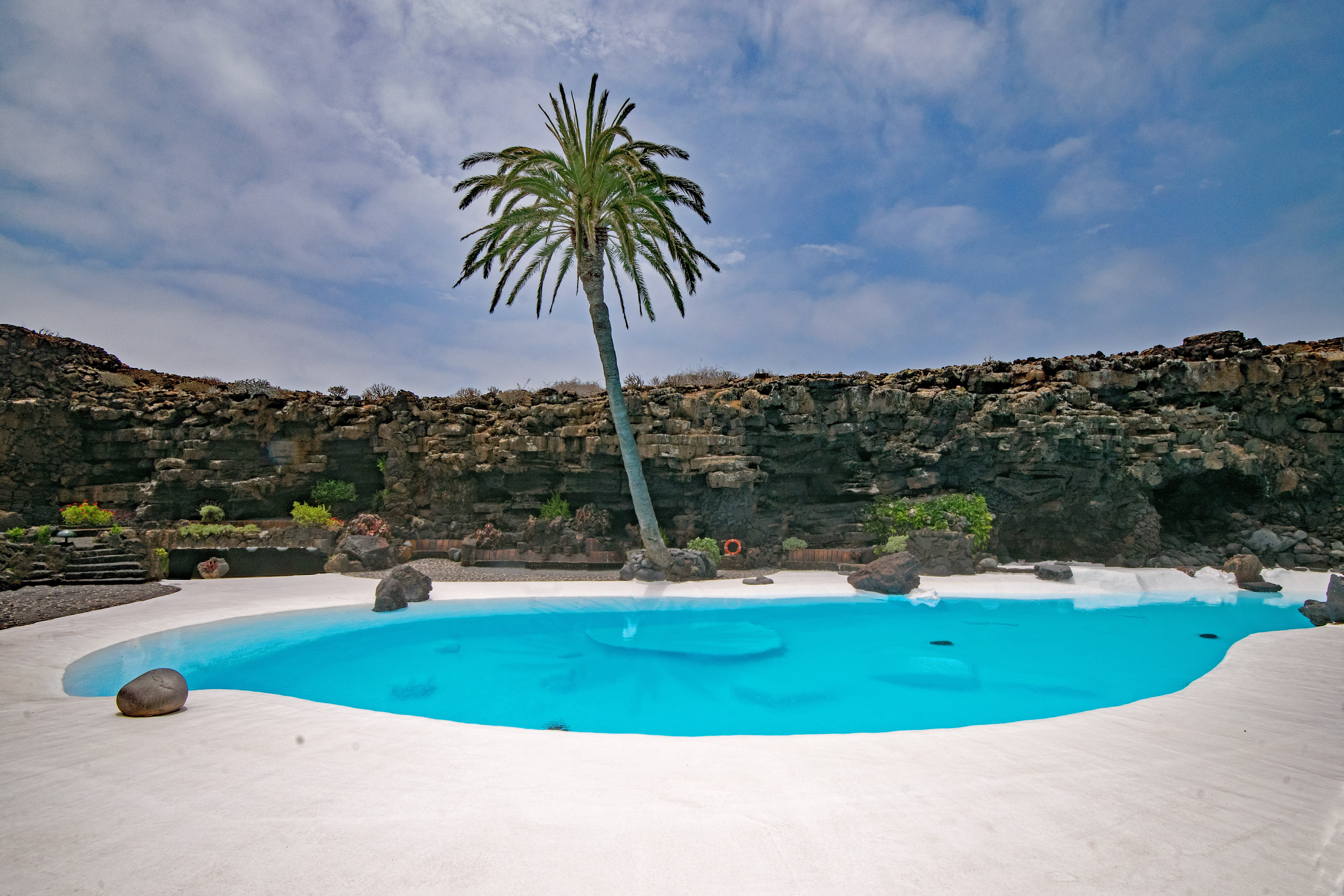 agua, oasis, swimming pool, day, Lanzarote, tree, plant, nature, turquoise colored, sky, tranquil scene, blue, lava cave, luxury, palm trees, canary islands, HD Wallpaper