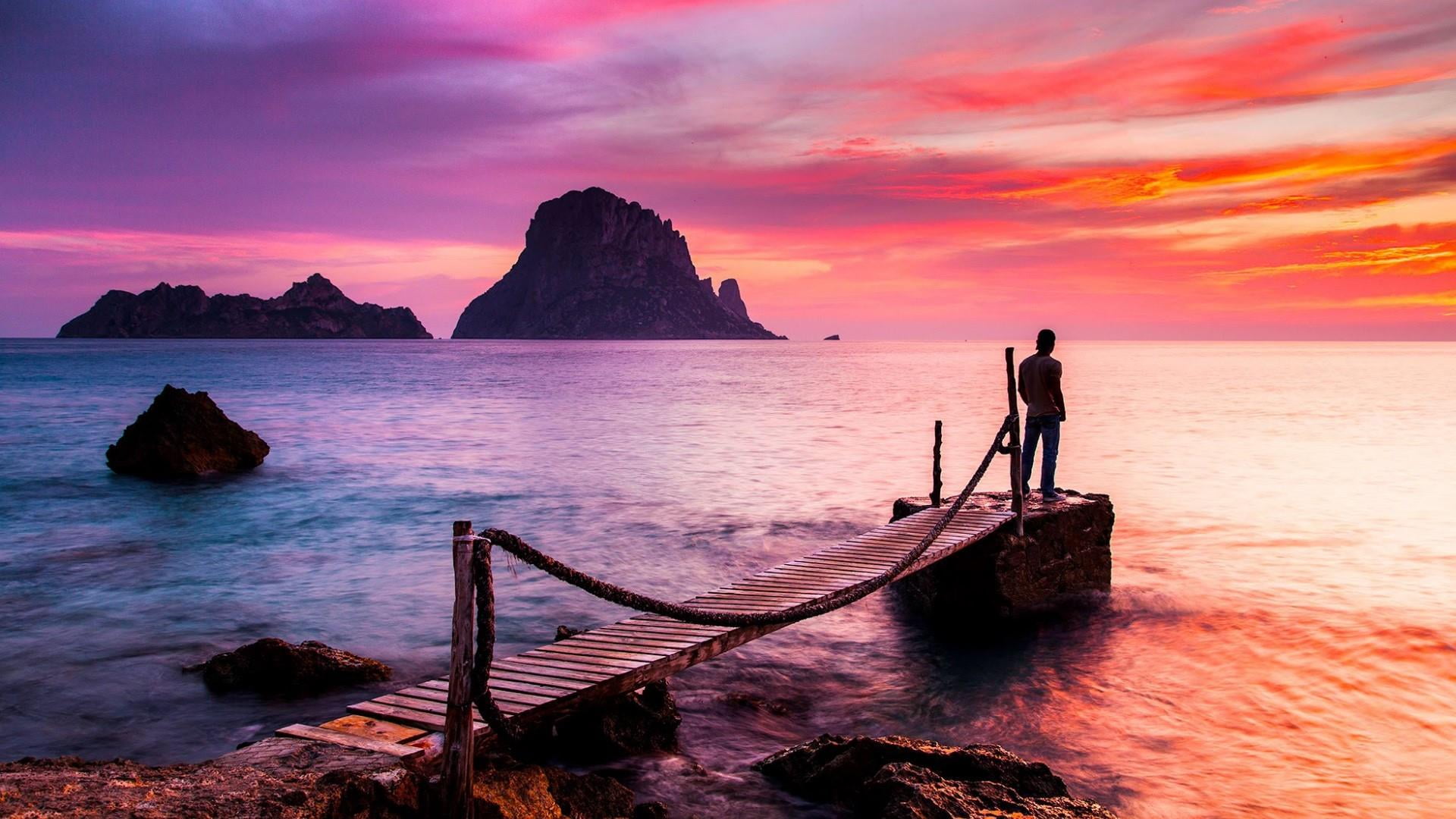 scenics - nature, horizon over water, orange sky, sky, man, rock - object, water, beach, pier, sea, land, rock, tranquility, 1080P, sunset, orange color, HD Wallpaper