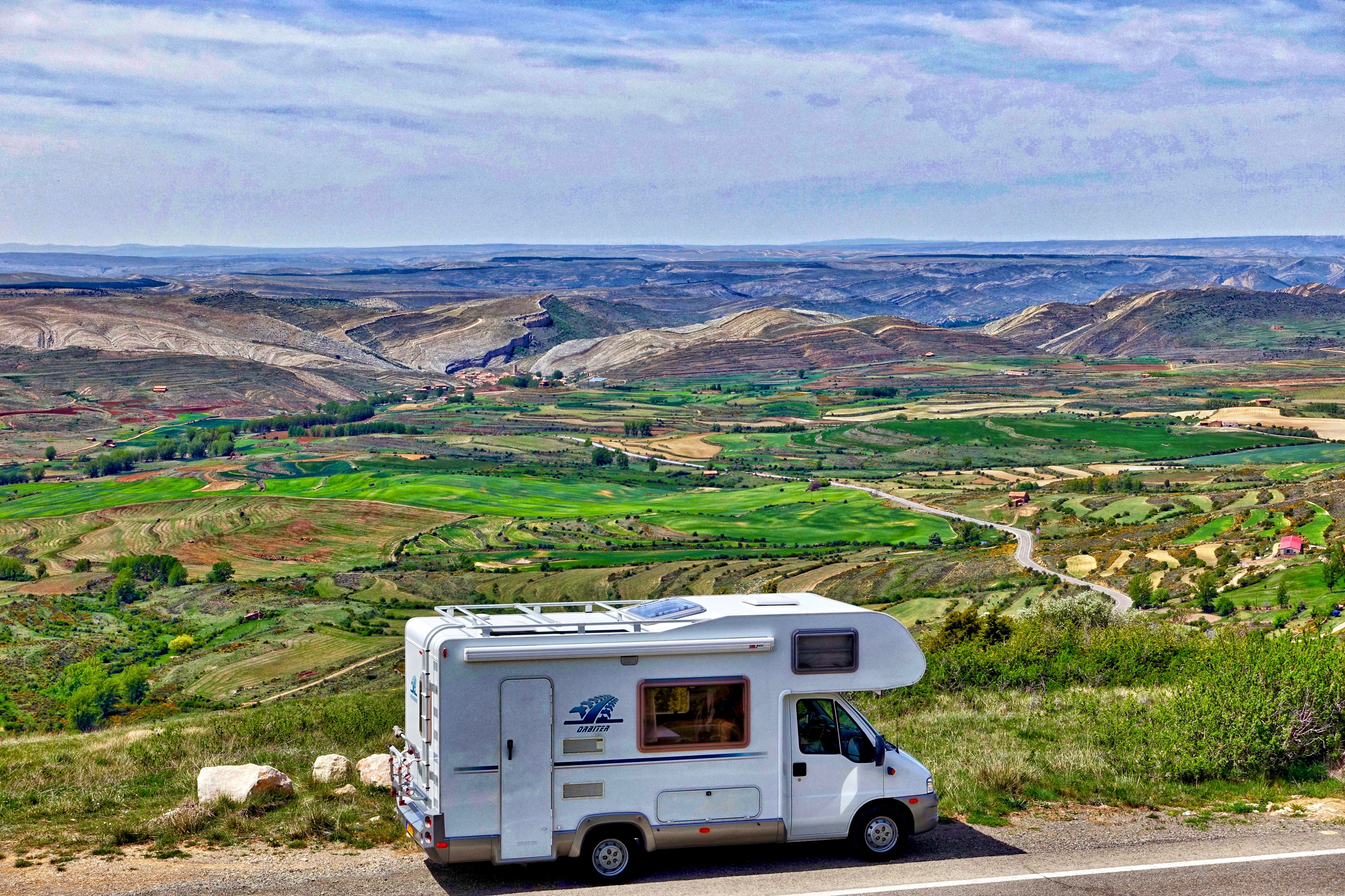 mode of transportation, road, environment, landscape, land vehicle, motor Home, day, transportation, recreational, rv, cloud - sky, gray, rv camping, grass, HD Wallpaper