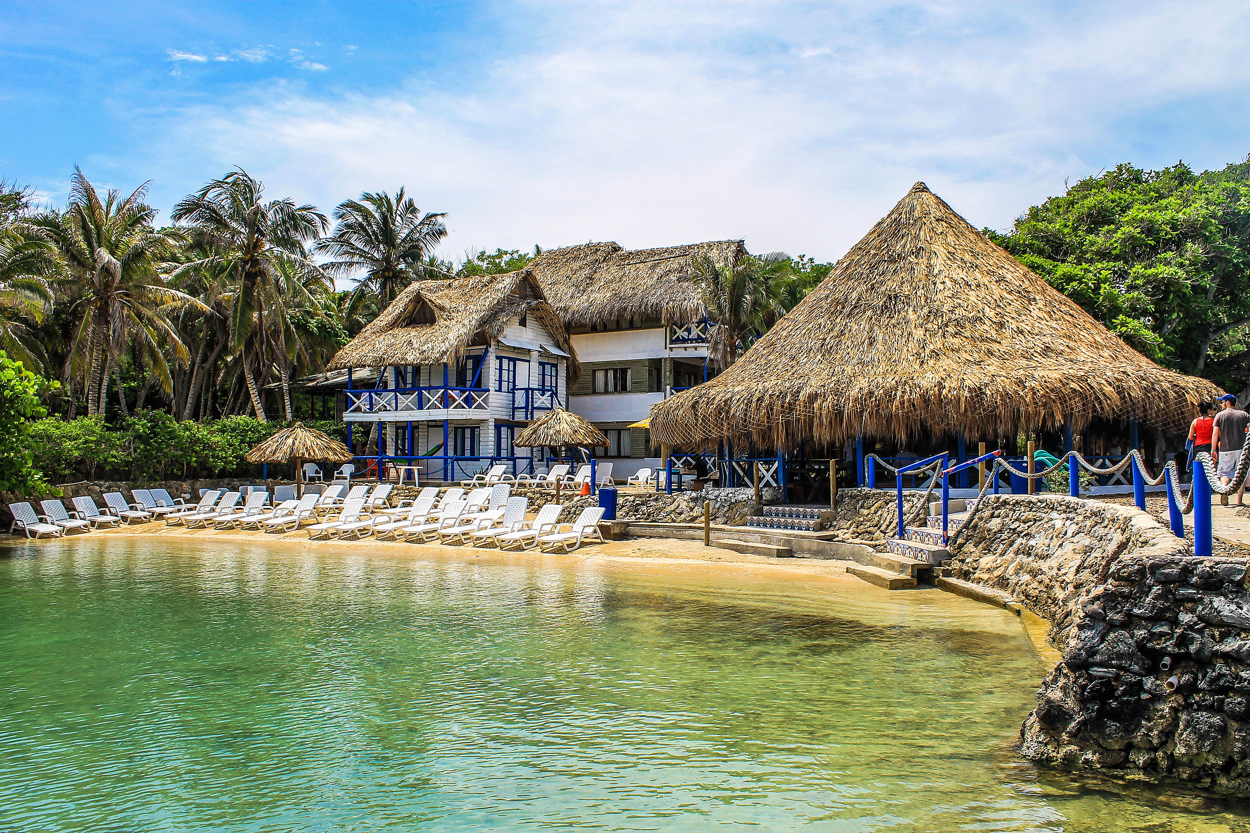 travel Destinations, city, architecture, plant, roof, water, built structure, thatched roof, palm Tree, building exterior, bungalow, island, travel, beach, HD Wallpaper