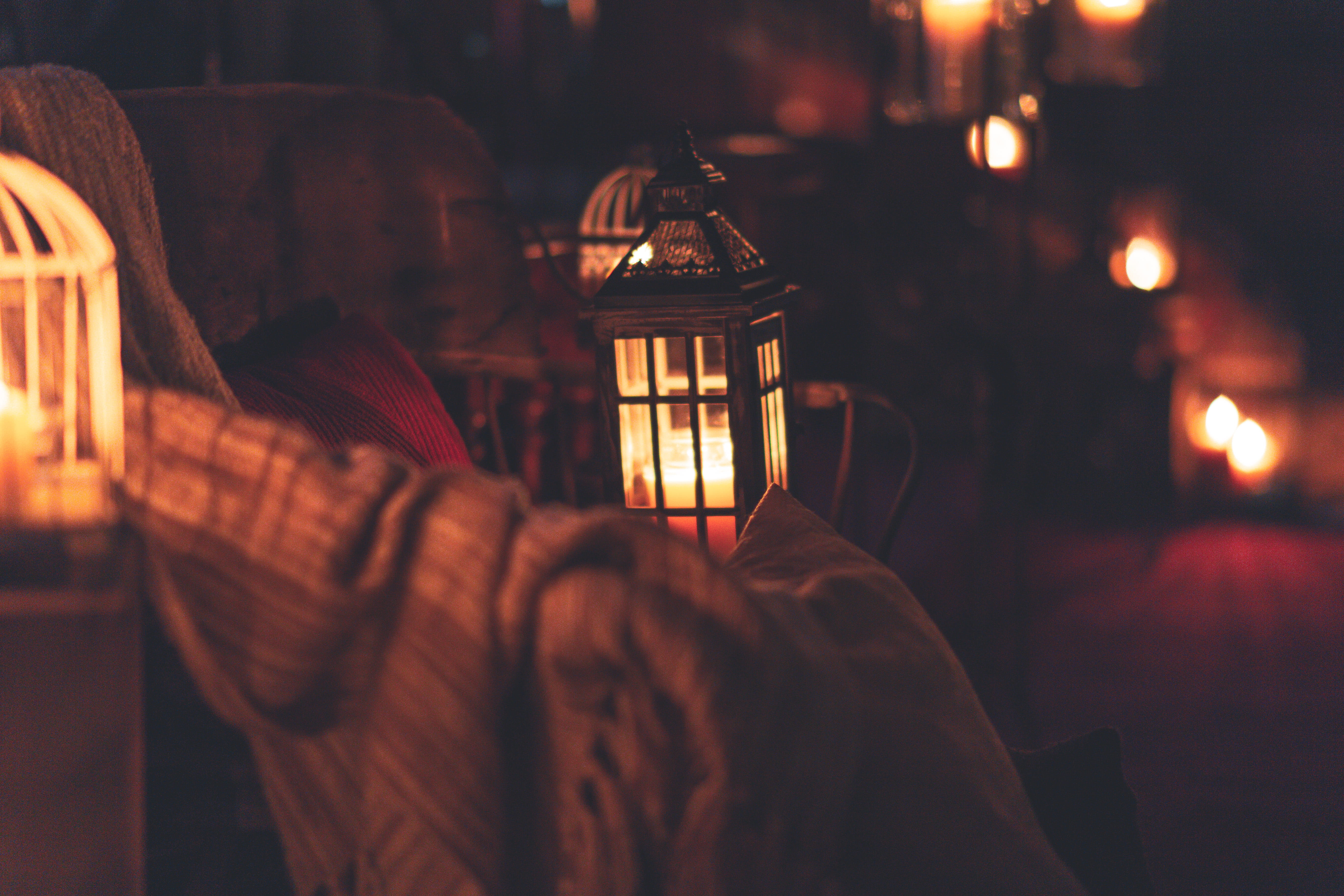 indoors, warm clothing, lamps, fire, blur, one person, electric lamp, flames, lighting equipment, lantern, blurred background, men, candle, candles, adult, HD Wallpaper