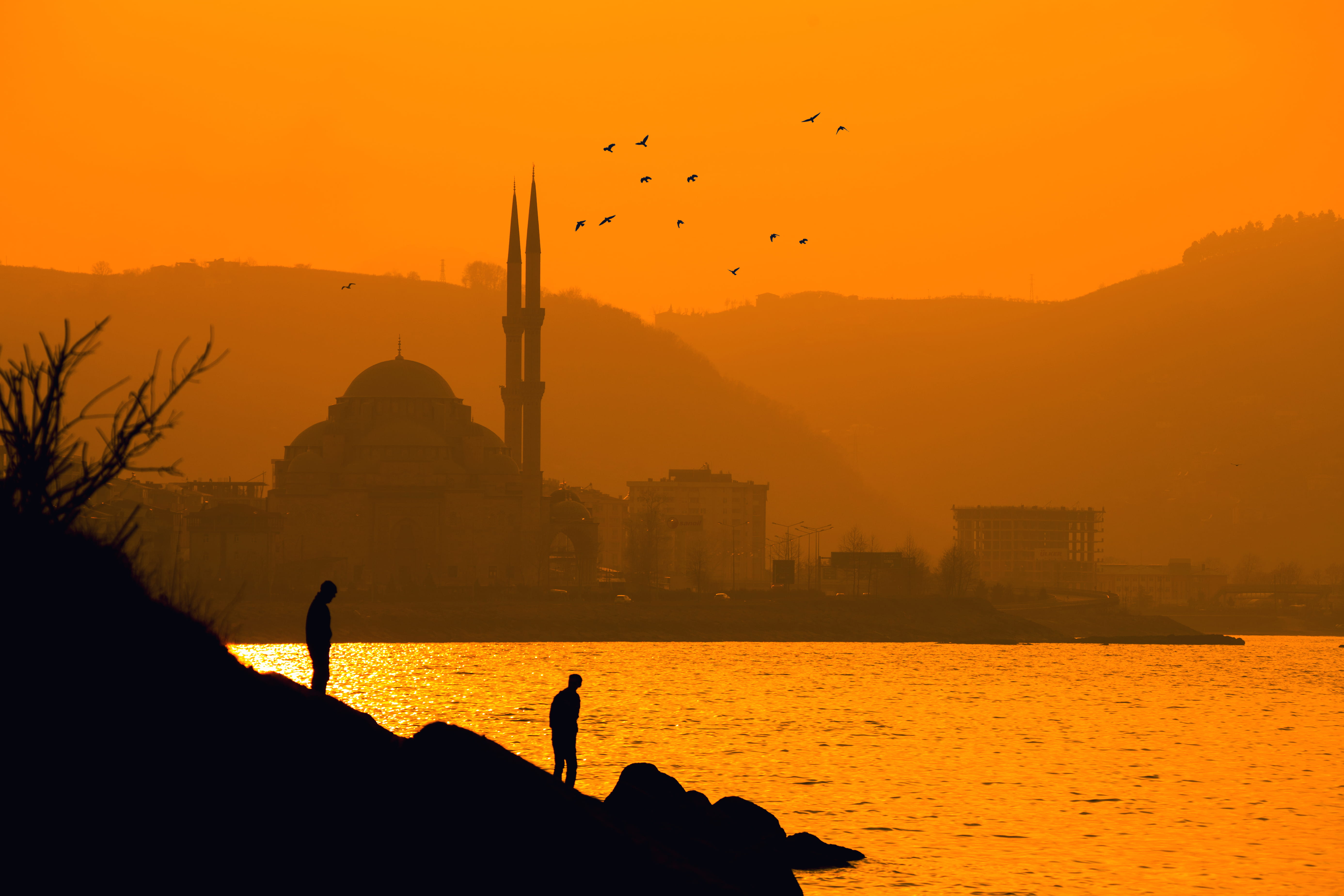 backlit, sea, people, cliff, vertebrate, turkey, seashore, mosque, beach, animal themes, ocean, near, silhouetted, water, landscape, sun, orange color, HD Wallpaper