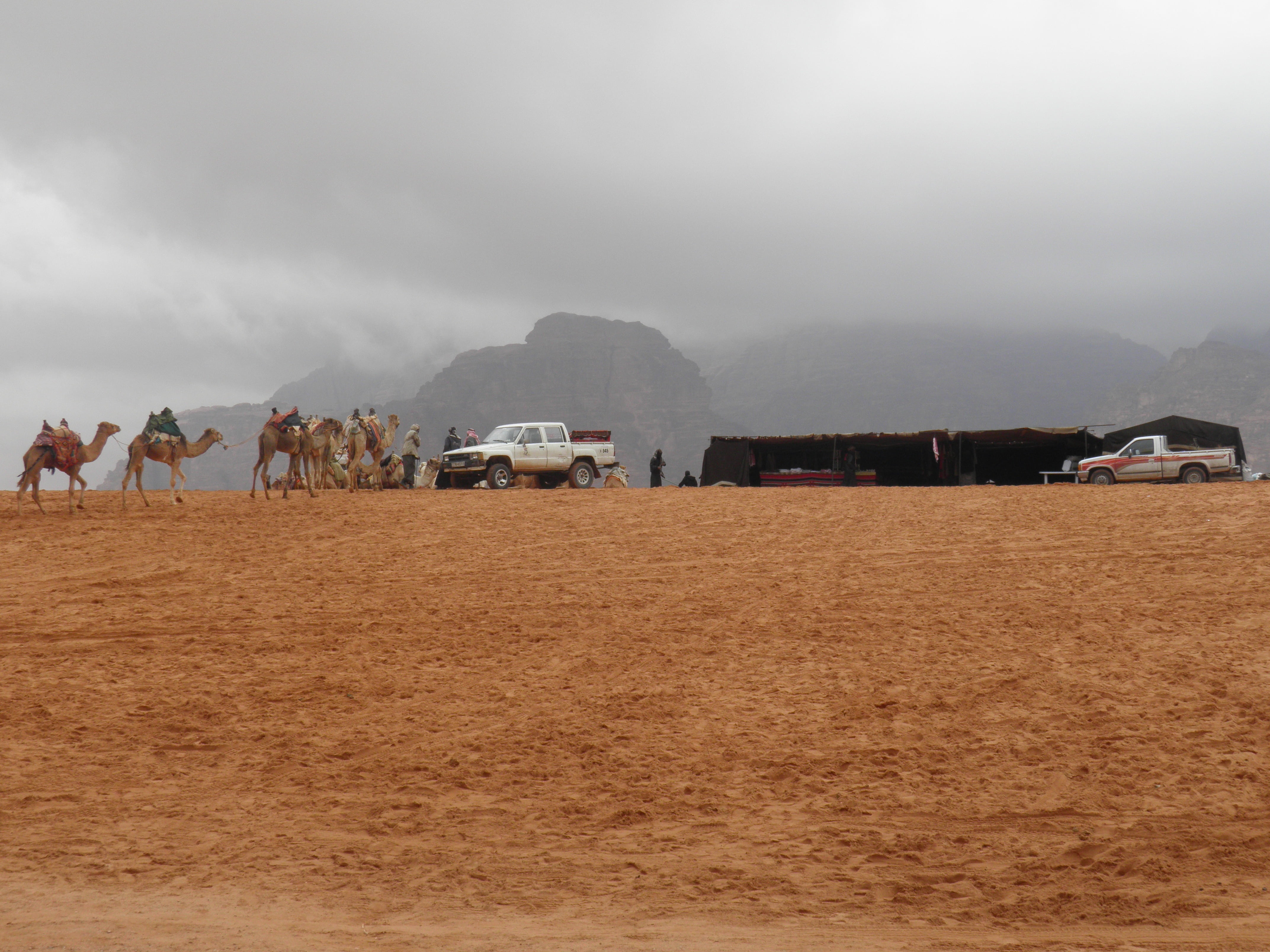 4K, outdoors, sand, incidental people, desert, group of people, mountain, landscape, sky, motor vehicle, jordan, wadi, fog, land, beauty in nature, animal themes, HD Wallpaper