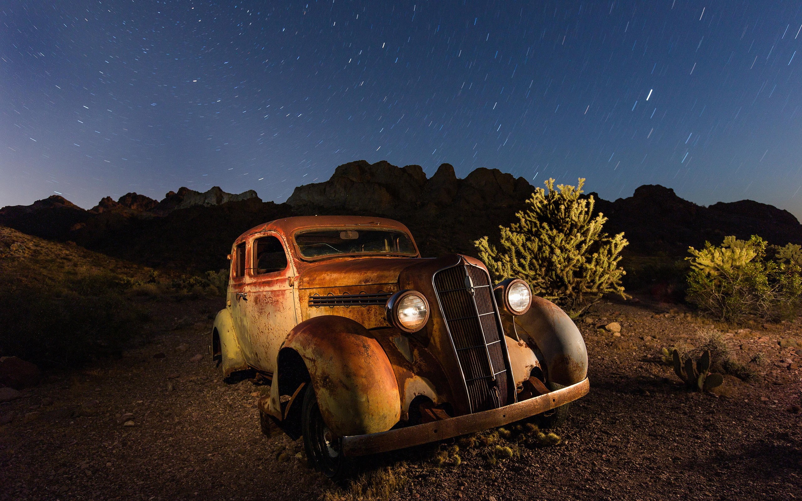 2K, night, wreck, long exposure, gravel, desert, vehicle, stars, mountains, rust, car, HD Wallpaper