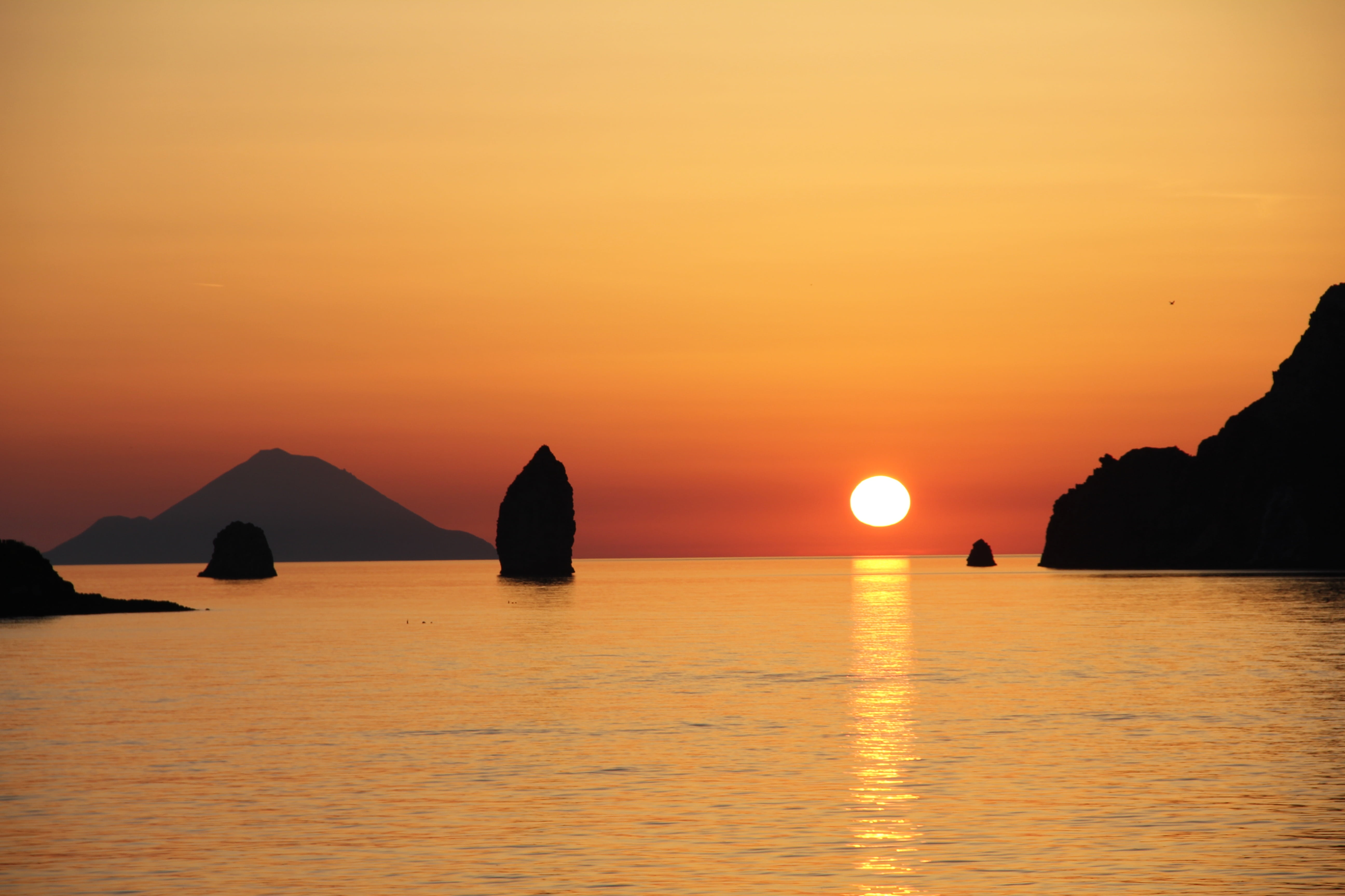 scenics - nature, tranquility, horizon over water, sun, water, sky, tranquil scene, orange color, sunset, vulcano, waterfront, 5K, rock, outdoors, aeolian islands, HD Wallpaper