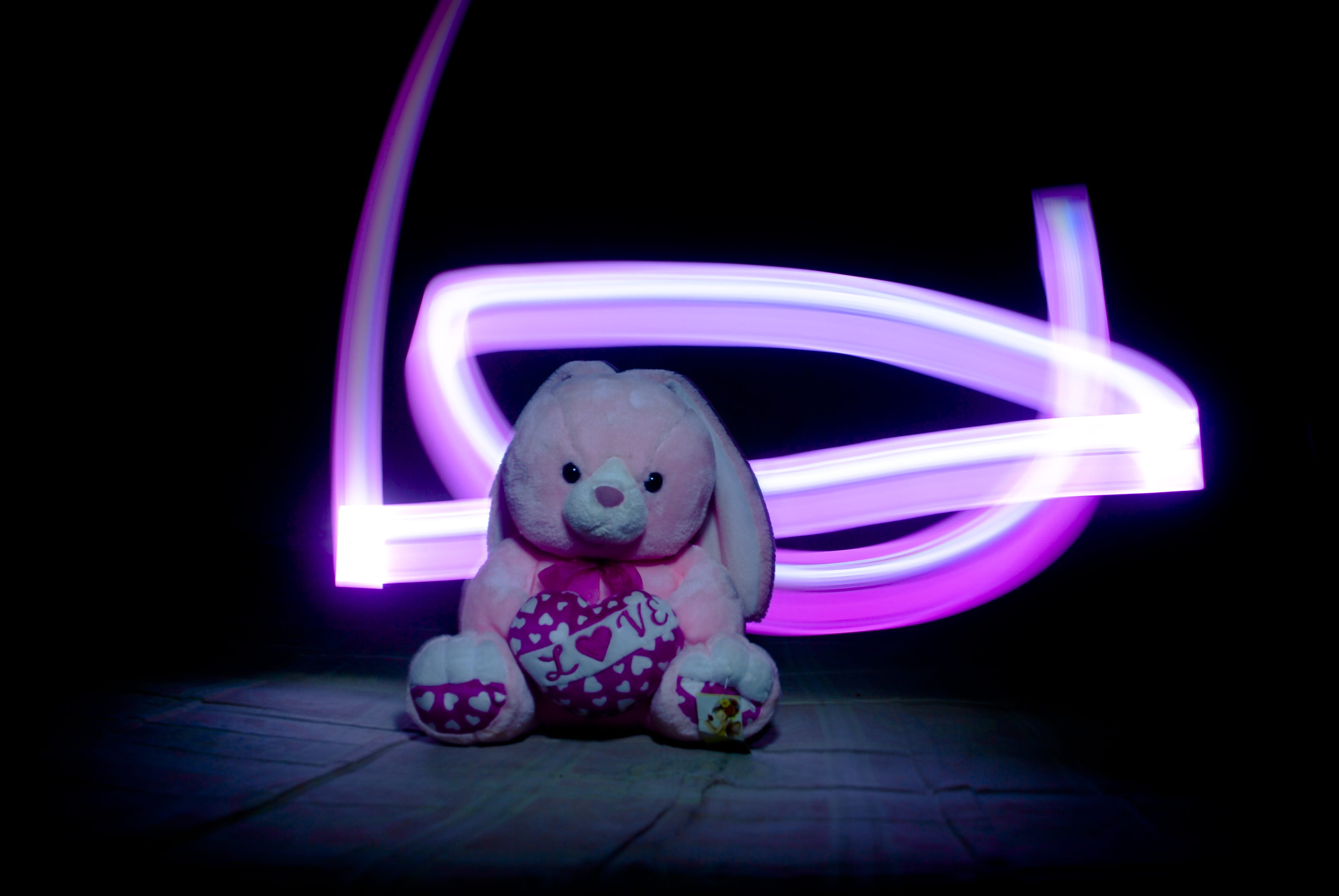 long exposure, animal, motion, pink color, dark, celebration, black background, pink, child, innocence, fun, little, 4K, toy, animal themes, emotion, creativity, HD Wallpaper