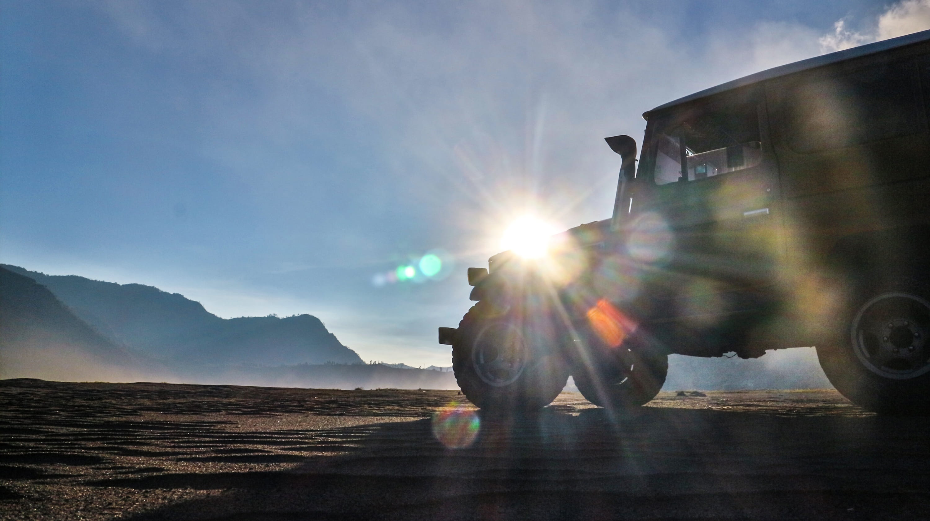 landscape, outdoors, adult, hiking, 2K, sky, truck, natural, sunrise, back lit, one person, volcano, sunlight, scenery, nature, land vehicle, peak, asia, HD Wallpaper